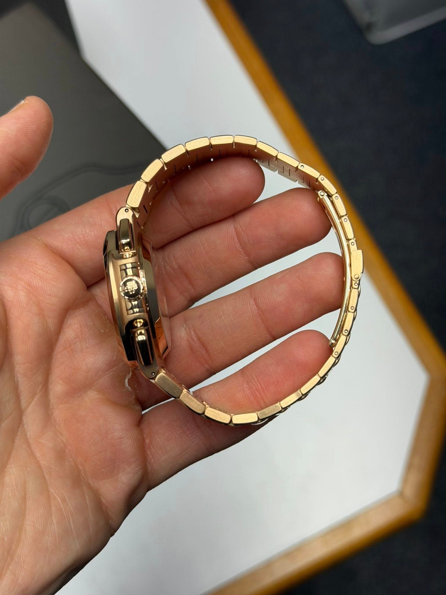 May be an image of jewelry and wrist watch