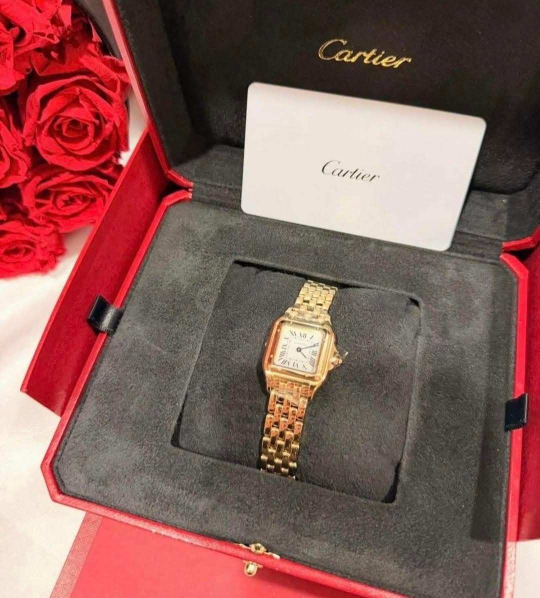 May be an image of wrist watch and text that says 'Cartier Cartier Cartier HITA'