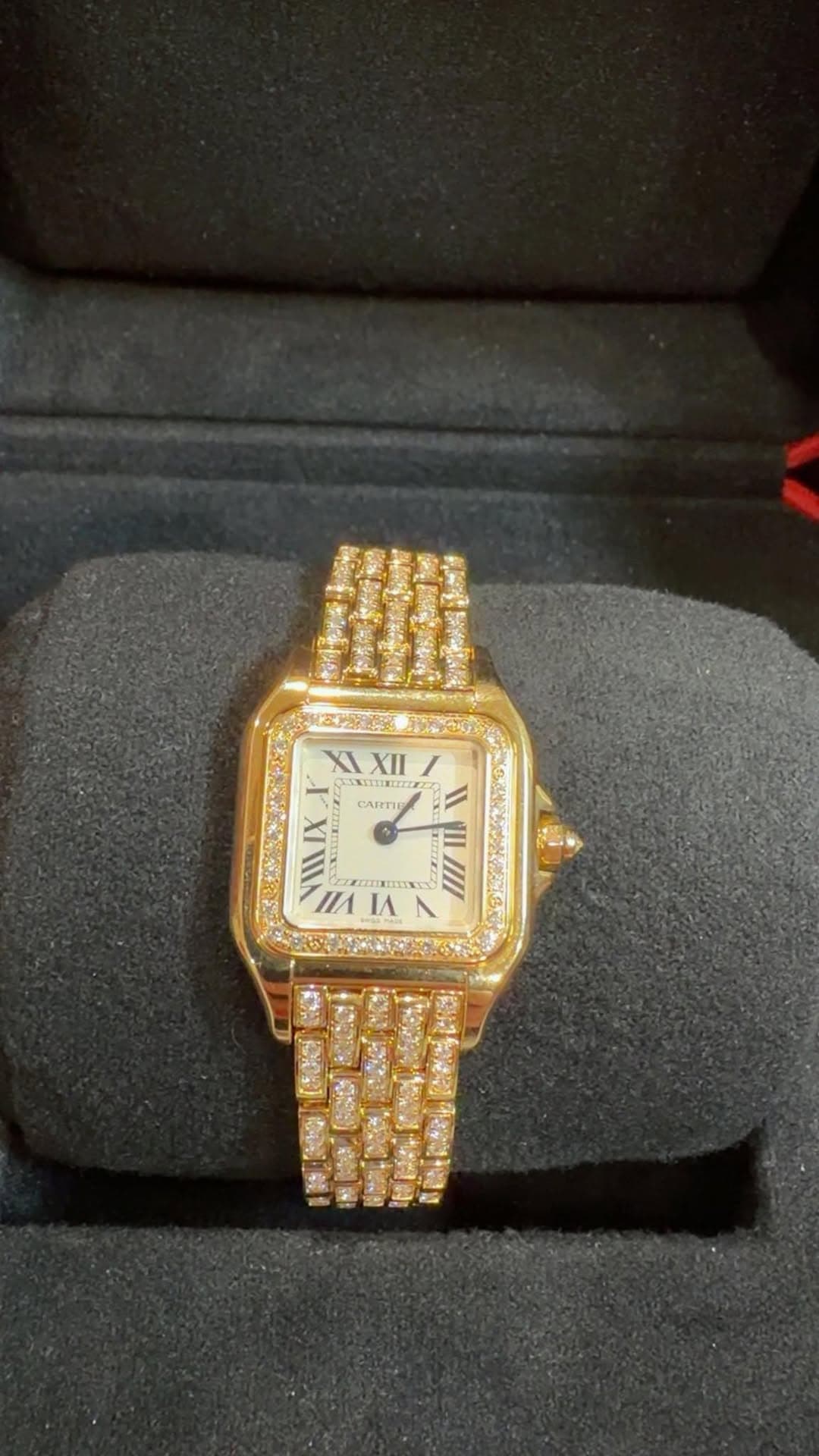 May be an image of wrist watch and text