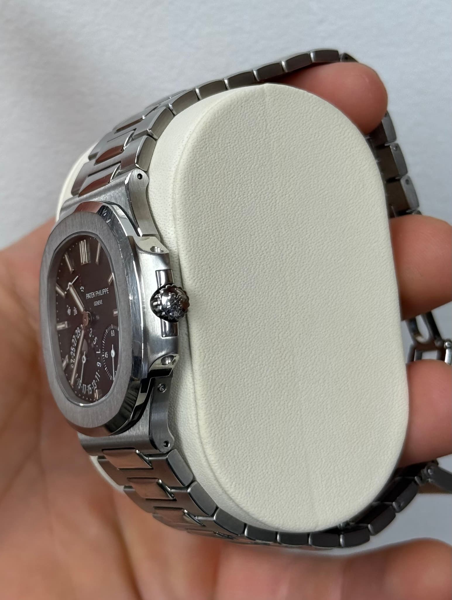 May be an image of wrist watch and text