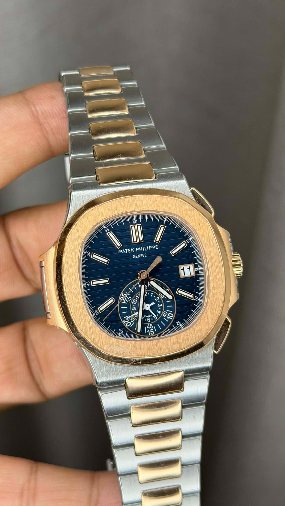 May be an image of wrist watch and text that says 'Ss 5 ም IO 0 PATEK TEK PHILIPPE GENEVE- 45 D 2- 1 Finoku w O원 - و 0% ក ហាហ 10l'