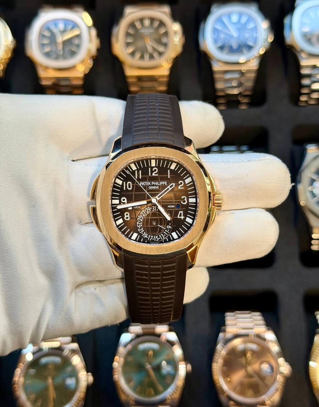 May be an image of wrist watch and text that says '2 PATEK PATEKPHILIPPE HILPPE GUNEVE 10 0 9 CK 8 -31 C 2 ครมล์ ព្ 3 4 ซ 19 6. نی مد ب رفی :'