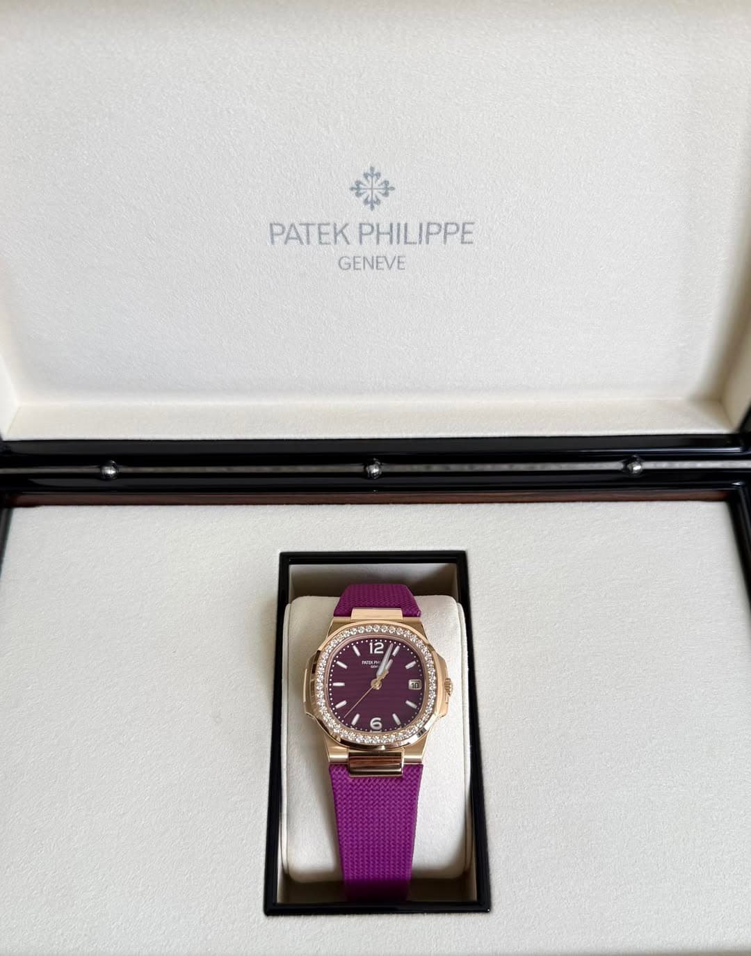 May be an image of wrist watch and text