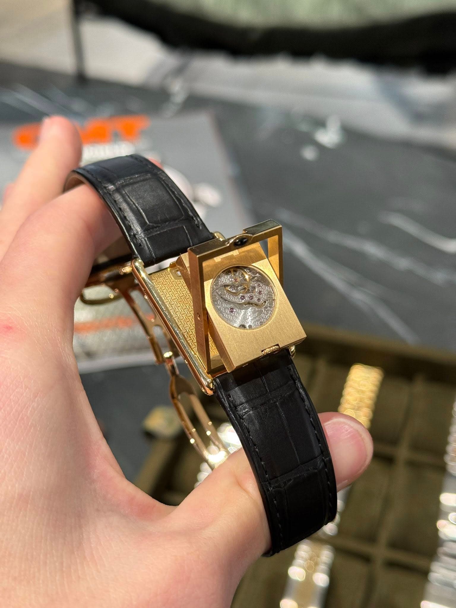 May be an image of wrist watch