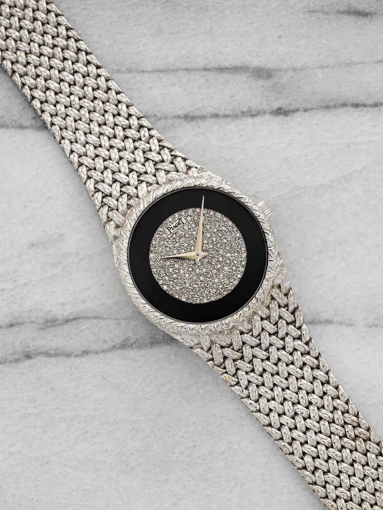 May be an image of wrist watch
