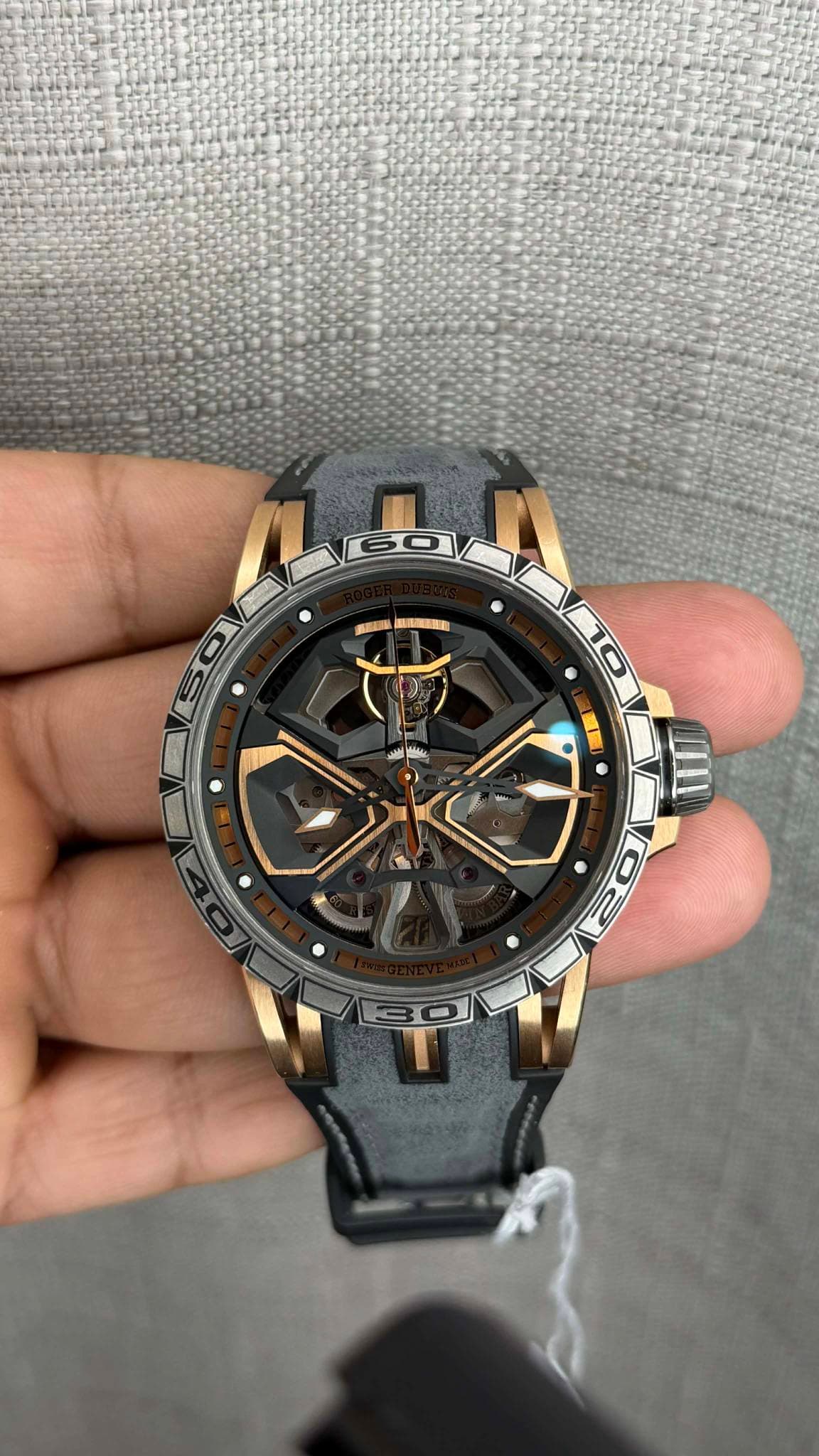 May be an image of wrist watch and text