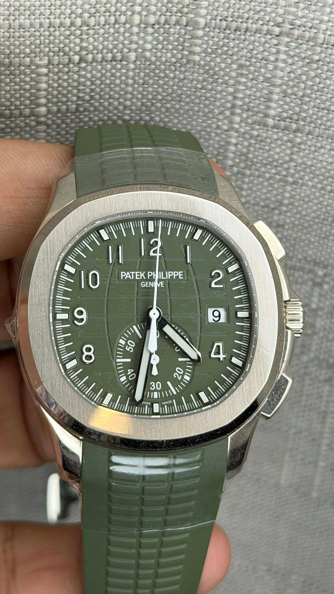 May be an image of wrist watch and text that says 'ήψ וין |1 PATEK PATEKPHILIPPE PHILIPPE ام 10 GENIVE GEN 9 2 9 50 C 00 4 8 יויויין T 20 I /٠ 30'