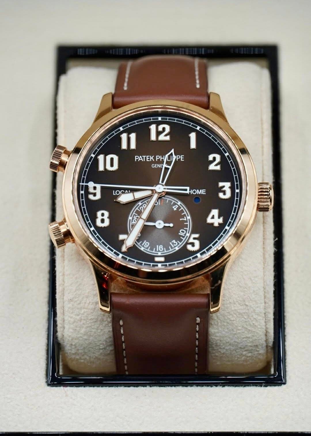 May be an image of wrist watch and text that says ' PATEK PATEKPH/LIPPE PH PE GENE 2 9 8 LOCAL HOME 20 61 b5 3 4 م 4 Όι 19 1o 16 ει 10 ر'