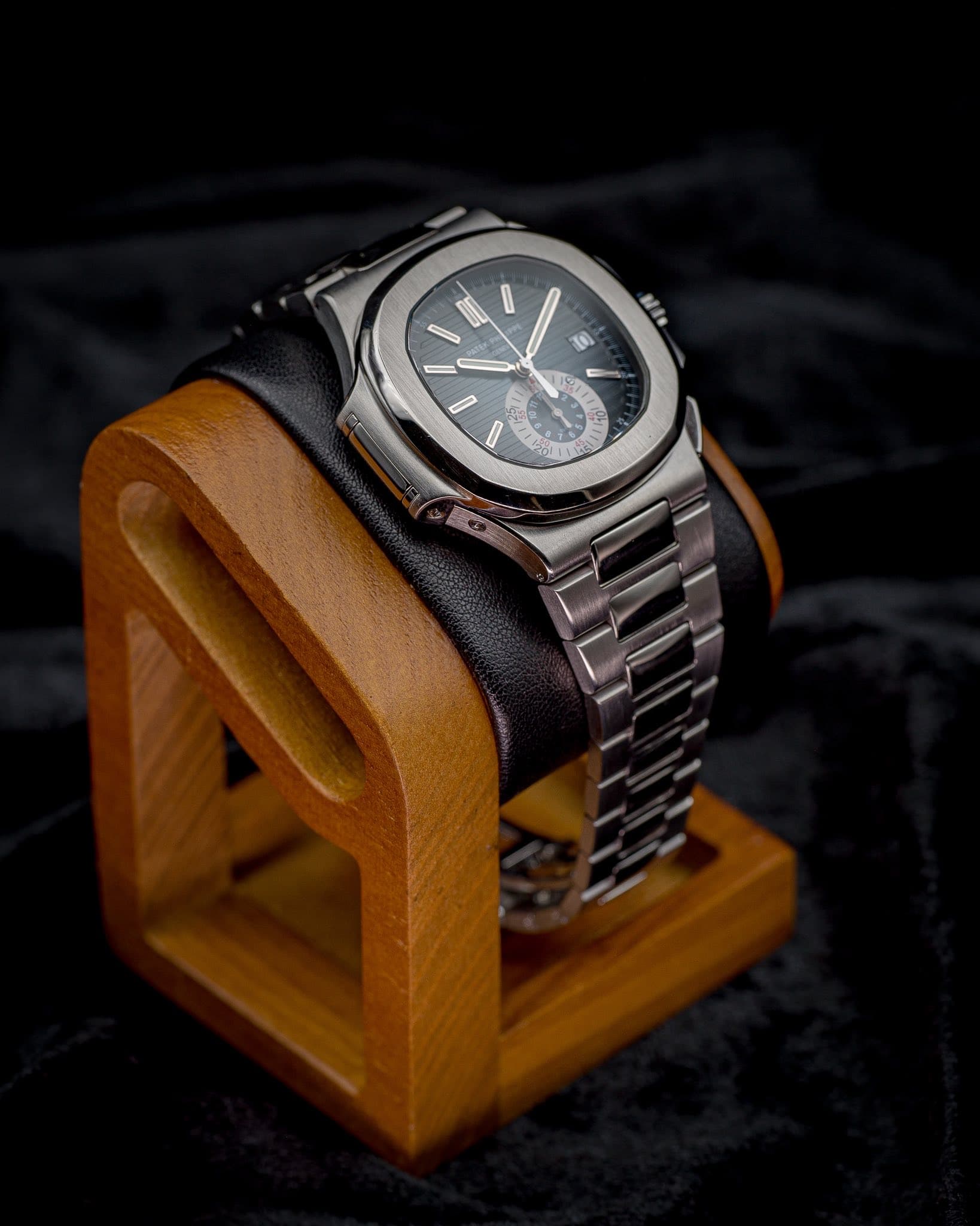 May be an image of wrist watch and text