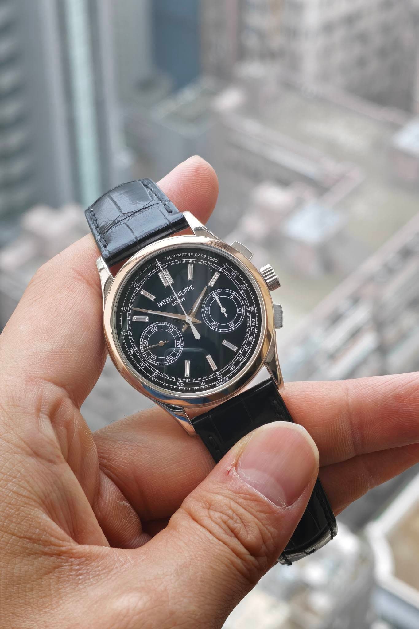 May be an image of wrist watch and text