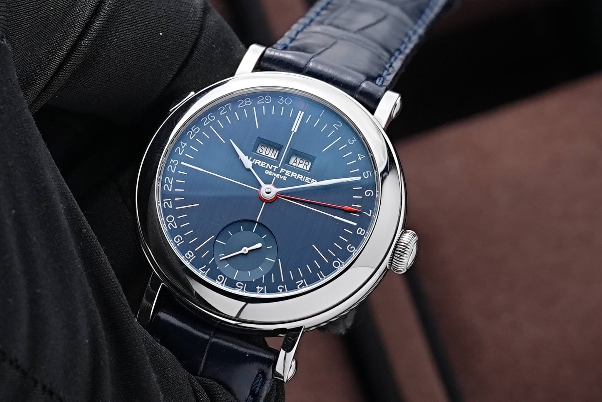 May be an image of wrist watch and text that says 'KaTmacobl ១ 8 3 4 SUN URENTFERRIEP OETFERRIEP GENEVE URENT APR FERRIEE 5 G 7 8 иι G ២ O ופ S ול ና. ZI'