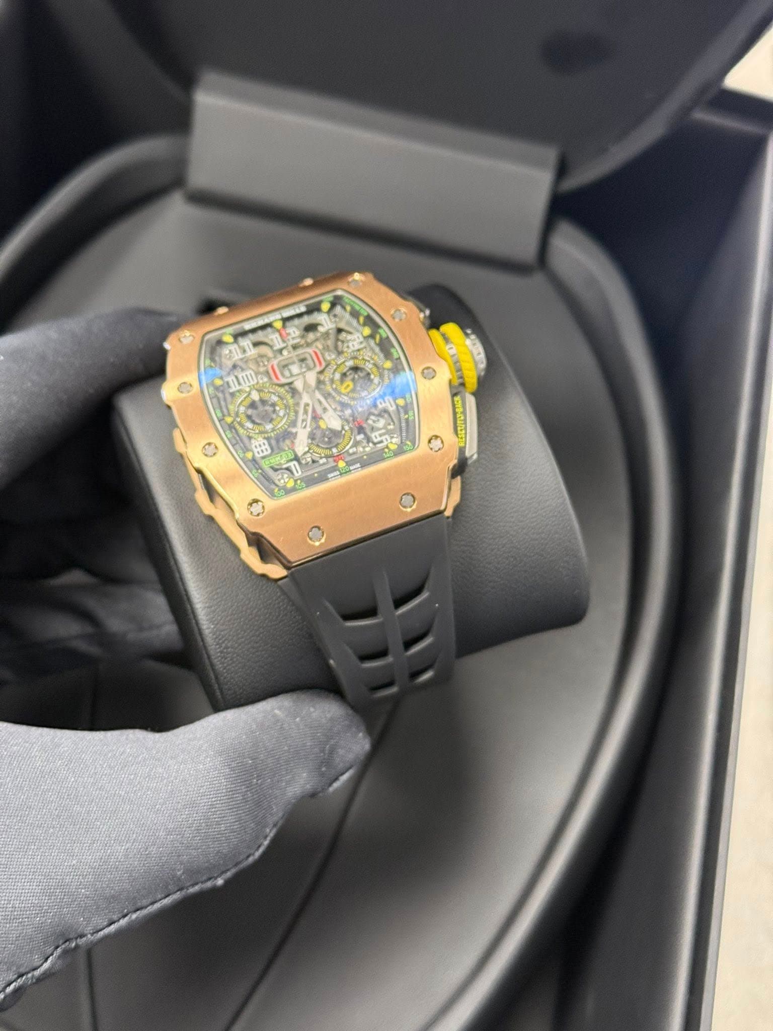 May be an image of wrist watch and text