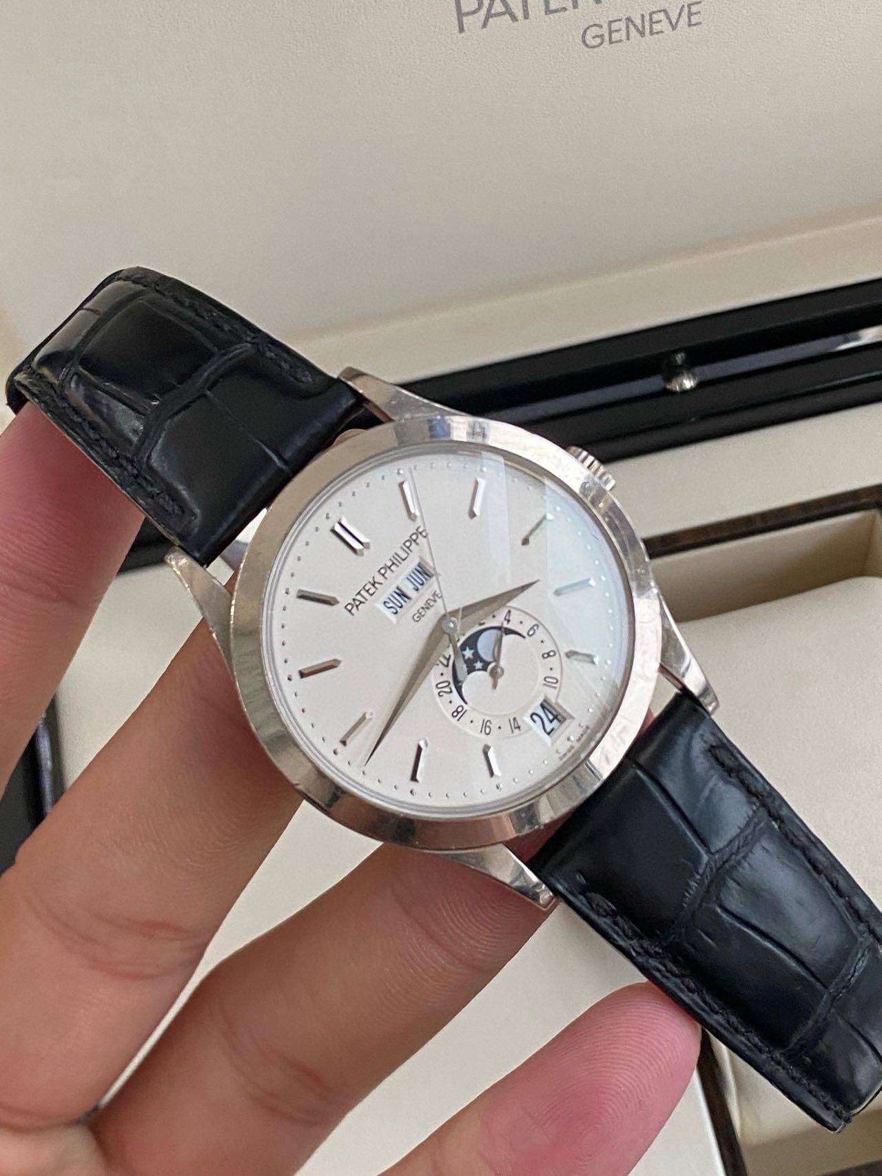 May be an image of wrist watch and text that says 'PAI မိးော GENEVE AULG II HILIPPE IPPE PATEK SUN TEKPHILIPP O JUN GENEVE YY o L በርሽ I I I'