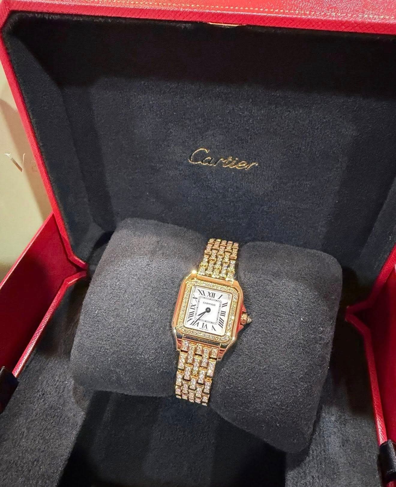 May be an image of wrist watch and text