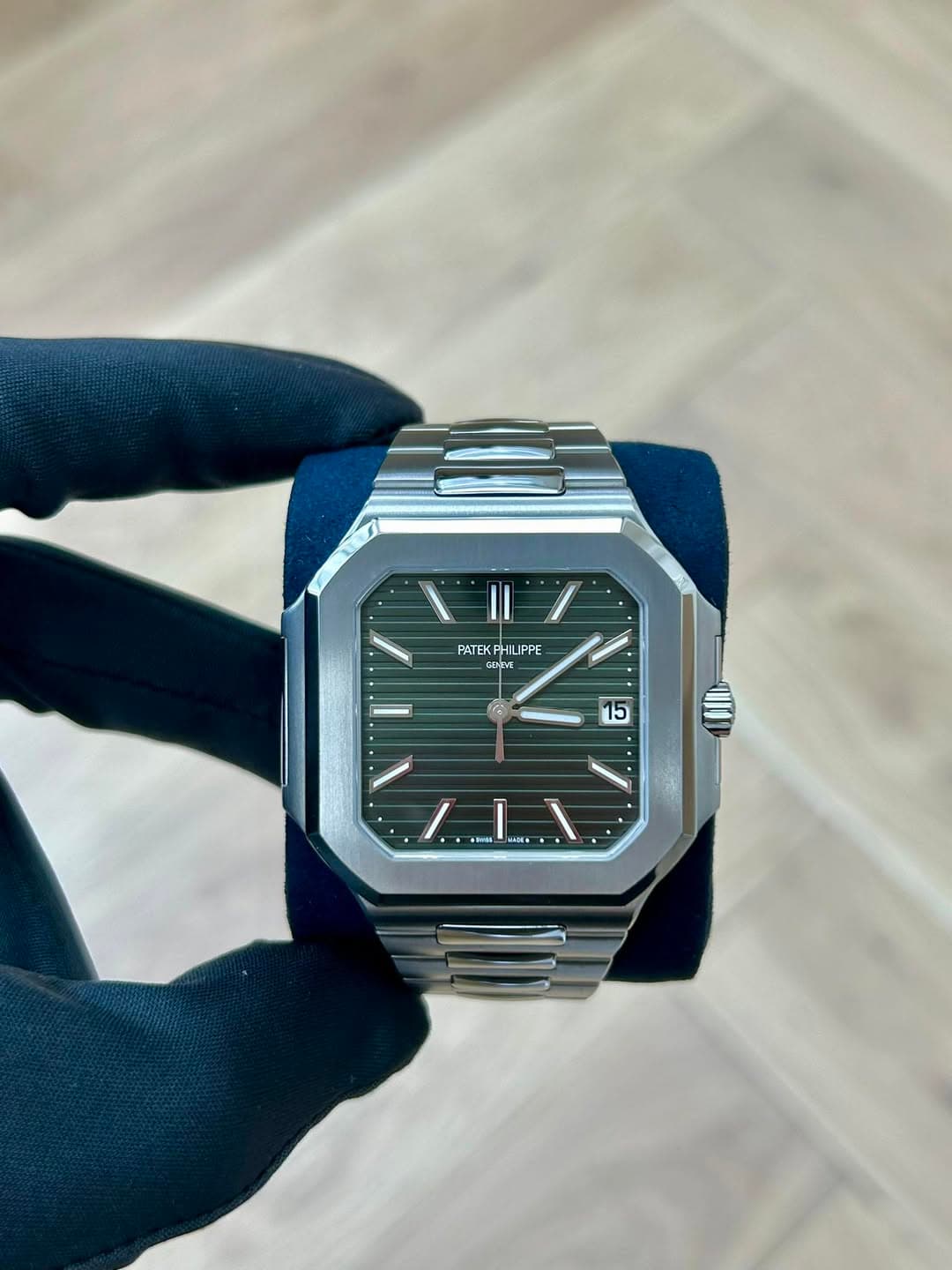 May be an image of wrist watch and text