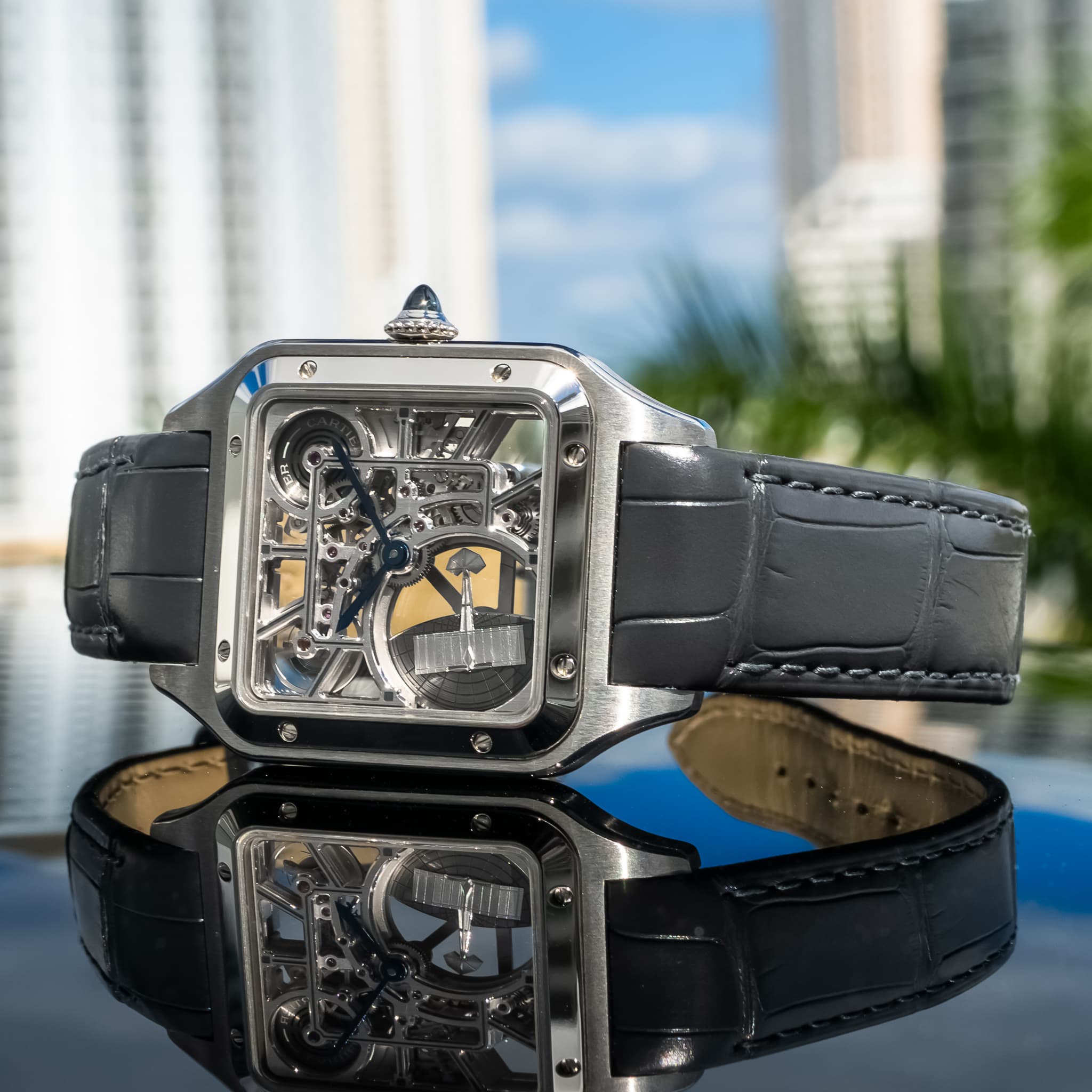 May be an image of wrist watch and text