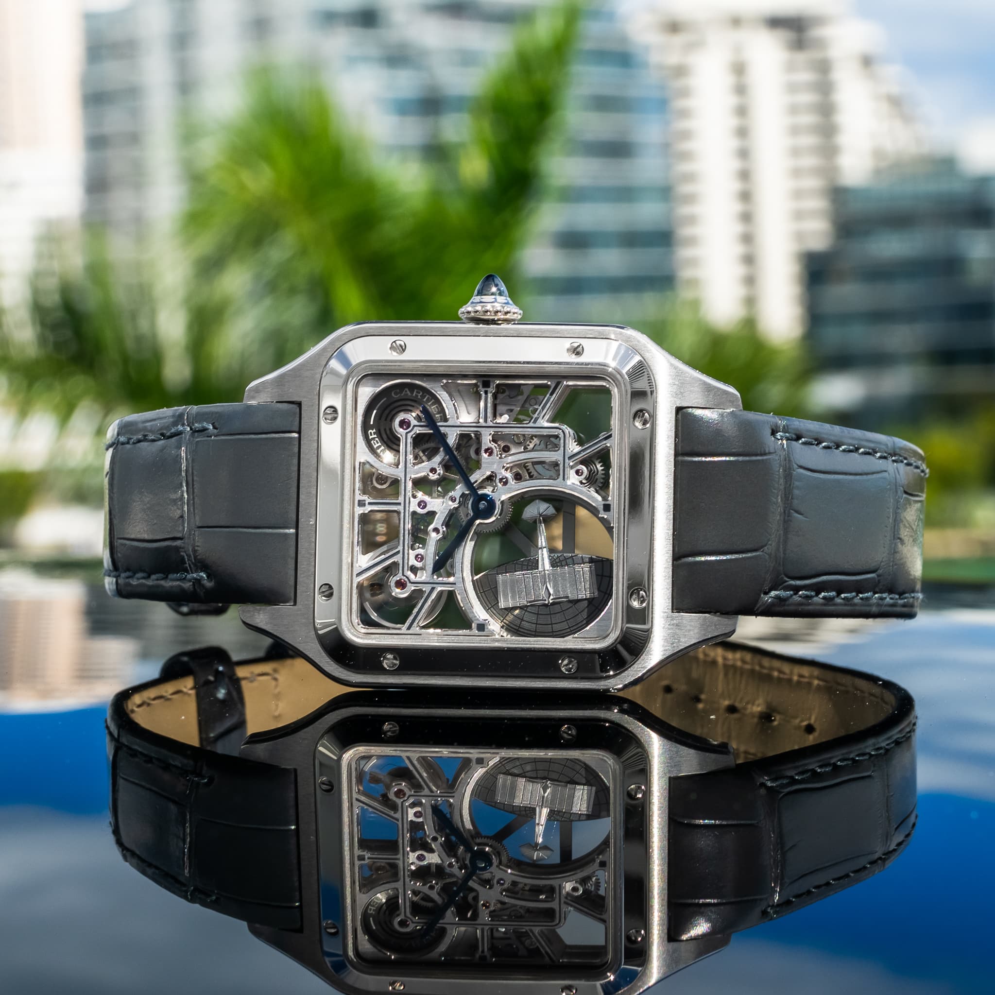 May be an image of wrist watch and text