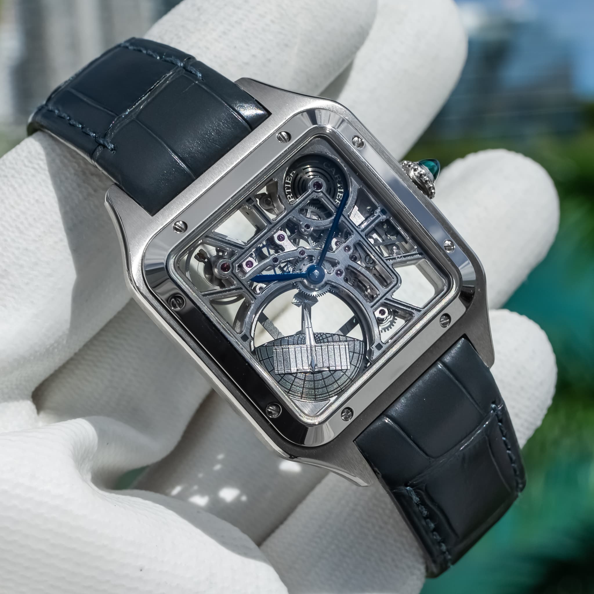 May be an image of wrist watch and text
