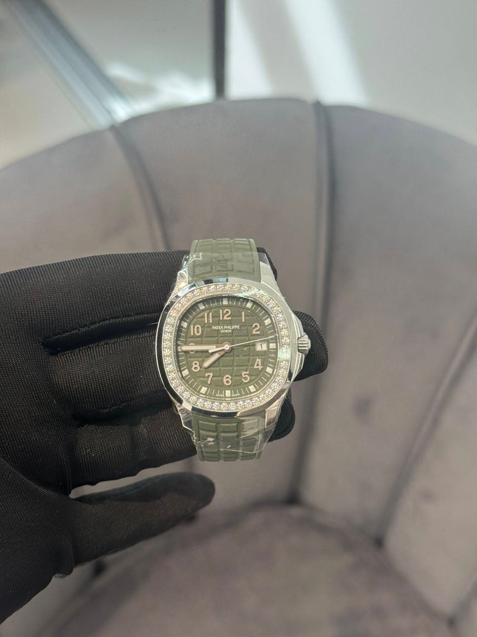 May be an image of wrist watch and text