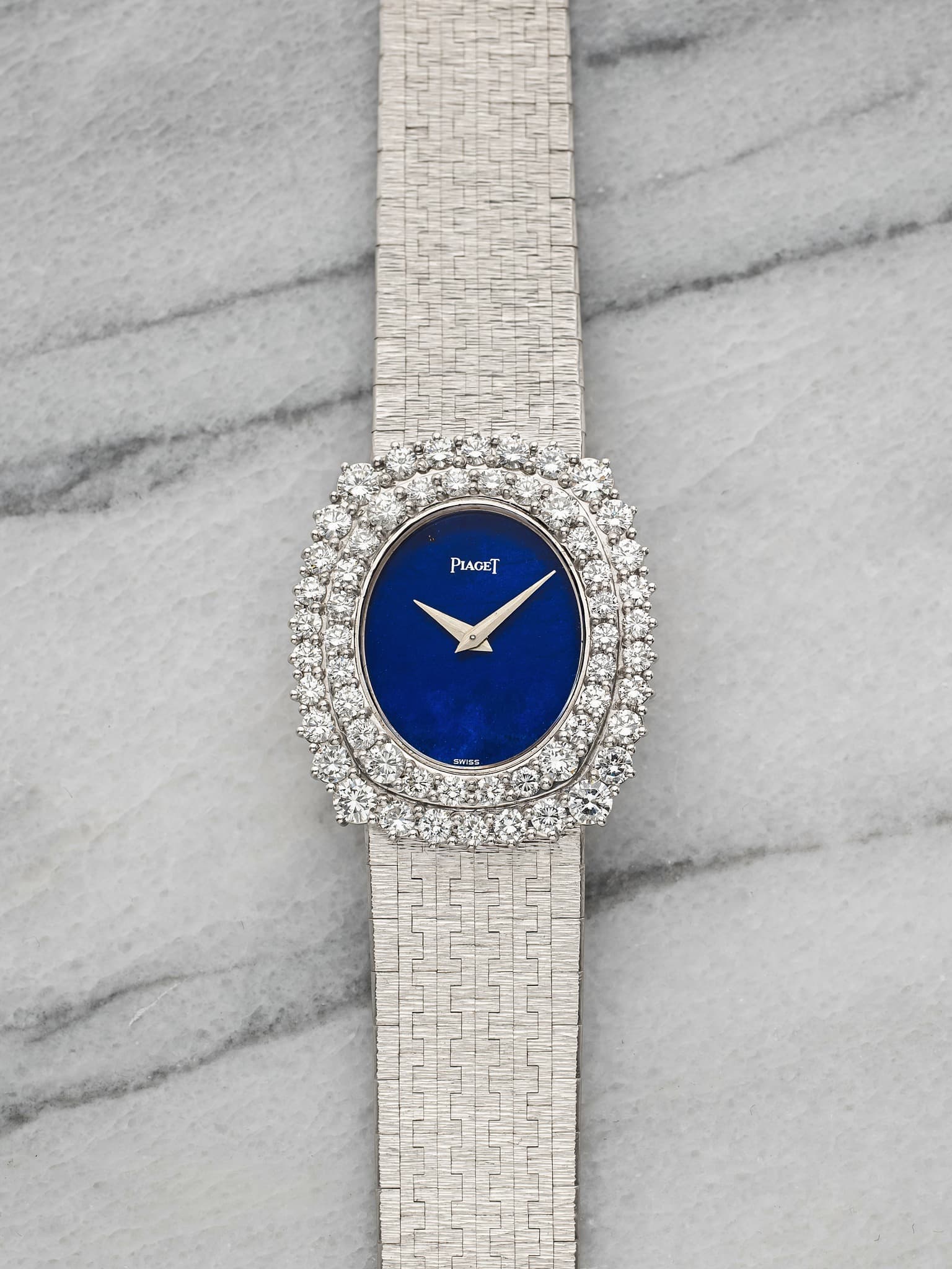 May be an image of wrist watch and text that says 'PIACET SAES'