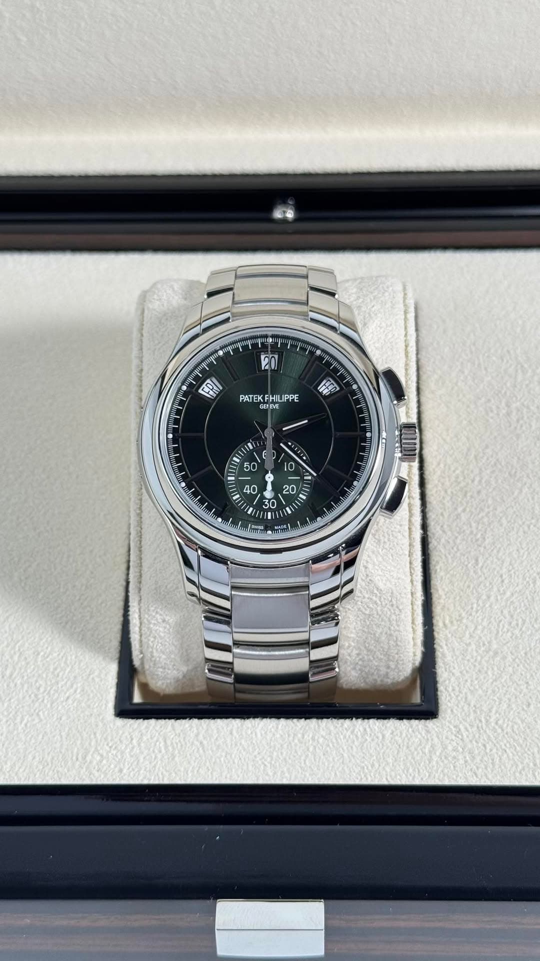 May be an image of wrist watch and text