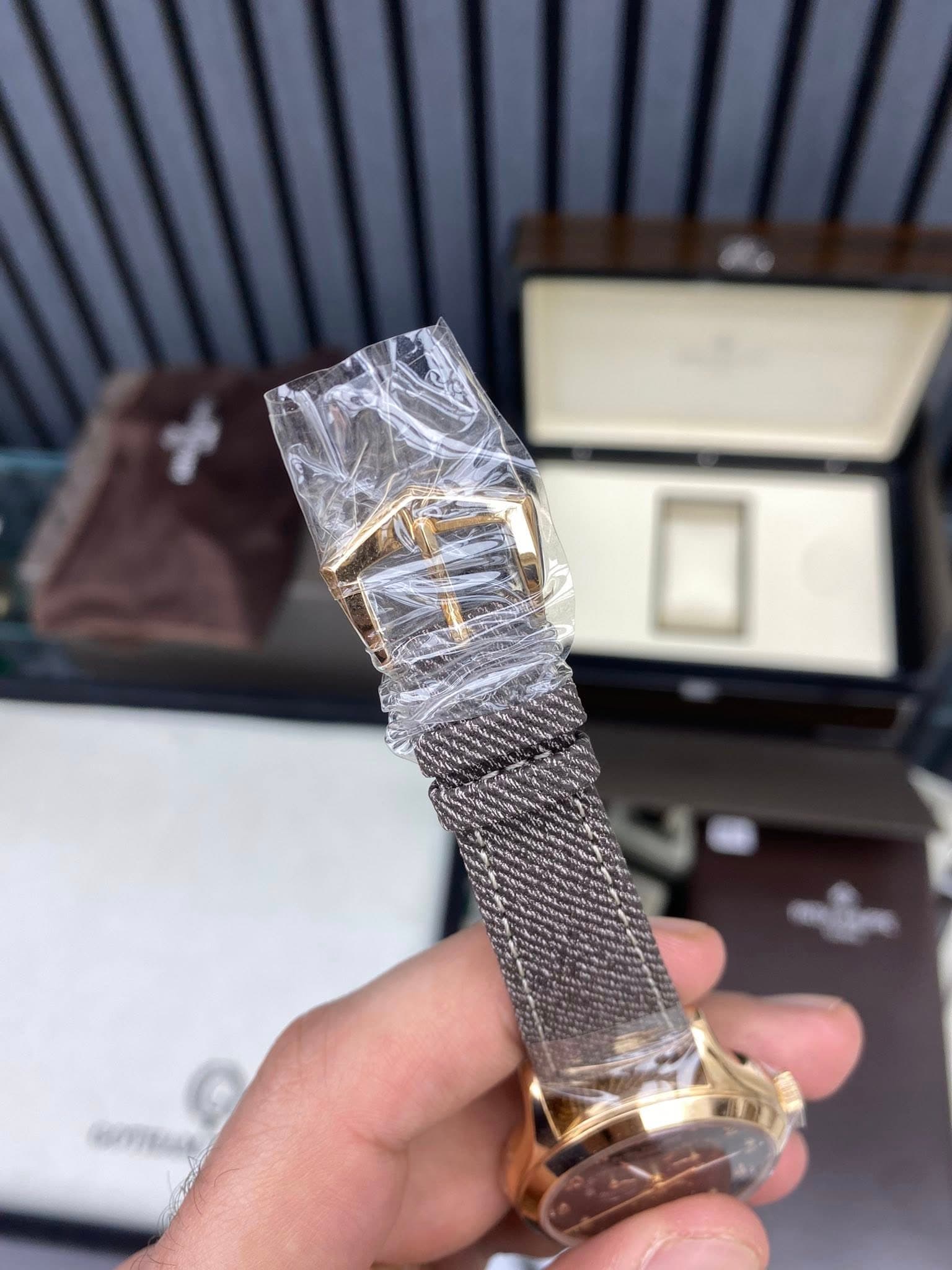 May be an image of wrist watch and text