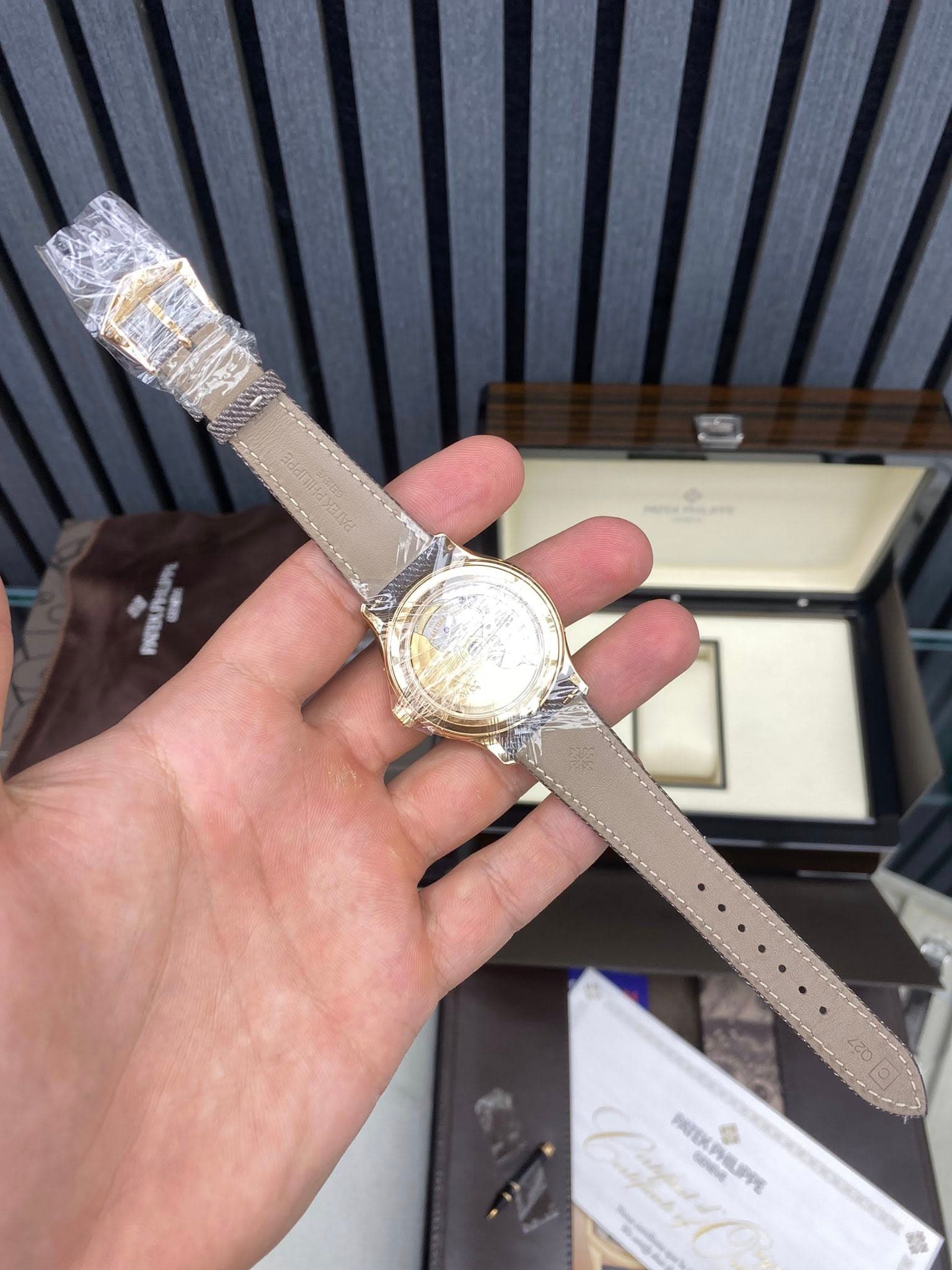 May be an image of wrist watch and text