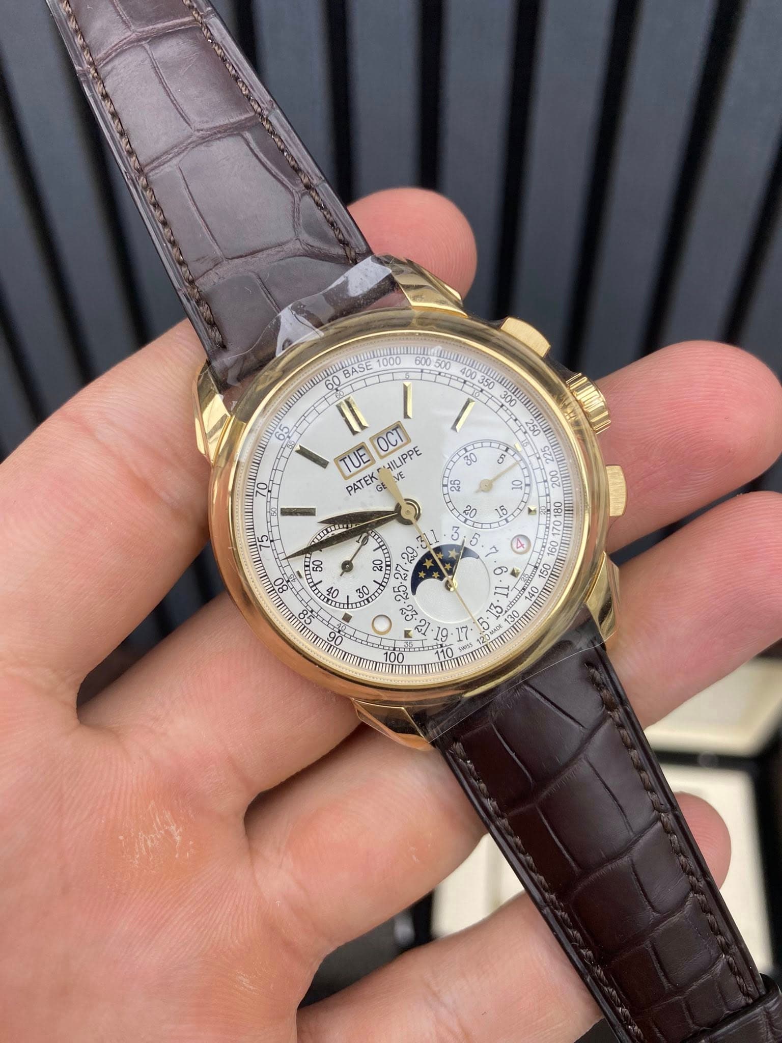 May be an image of wrist watch and text