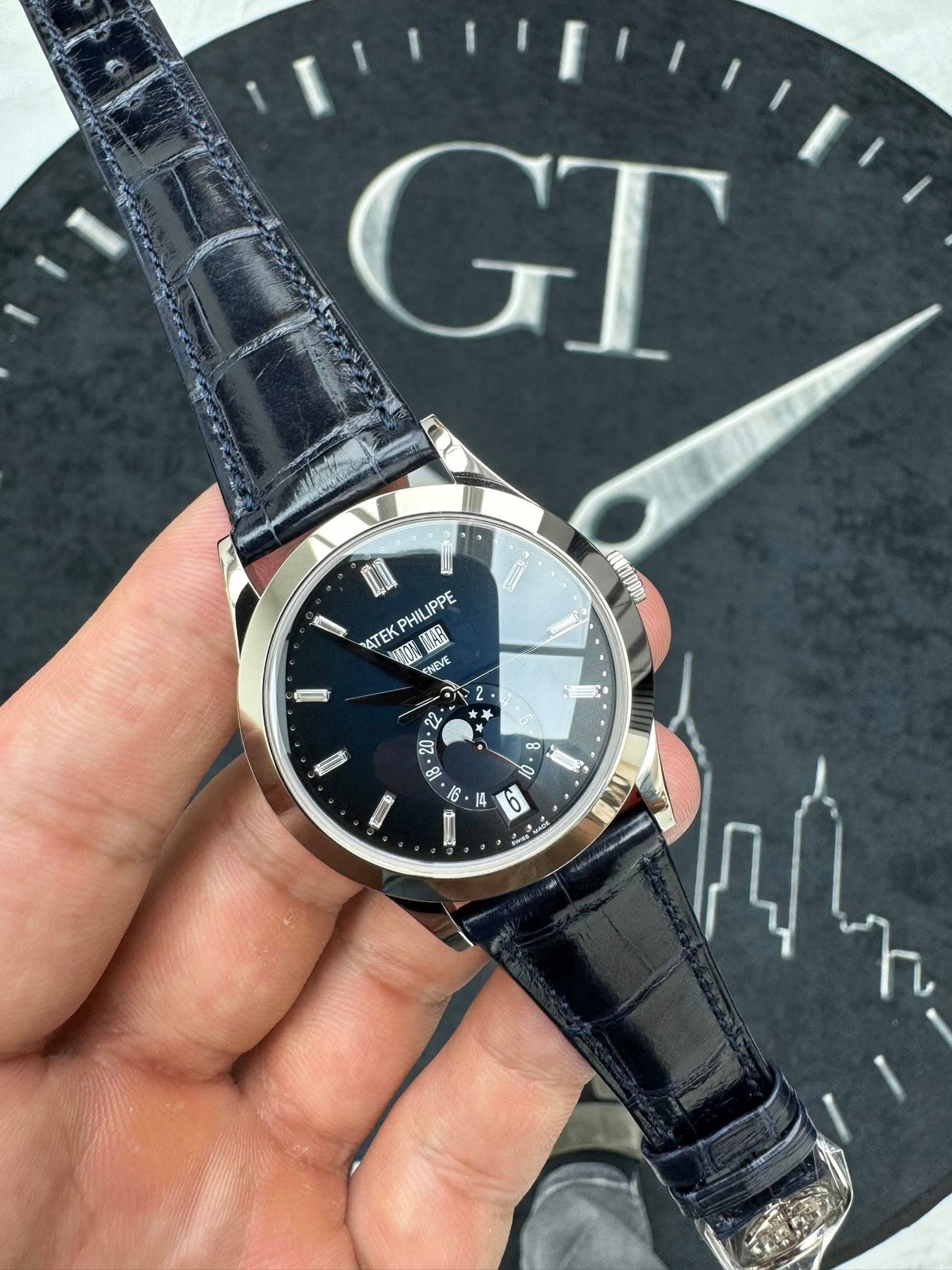 May be an image of wrist watch and text