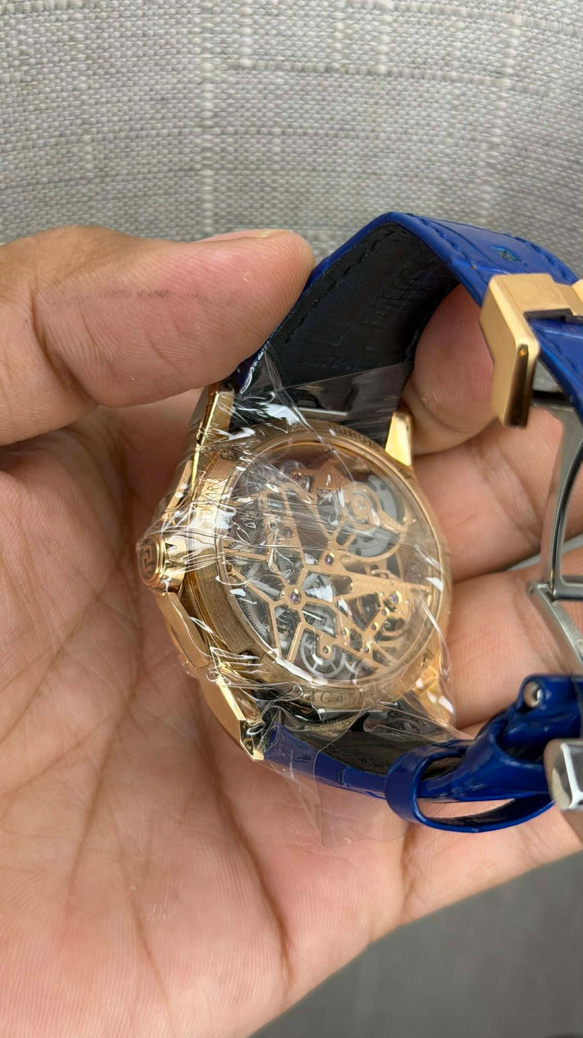 May be an image of brass and wrist watch