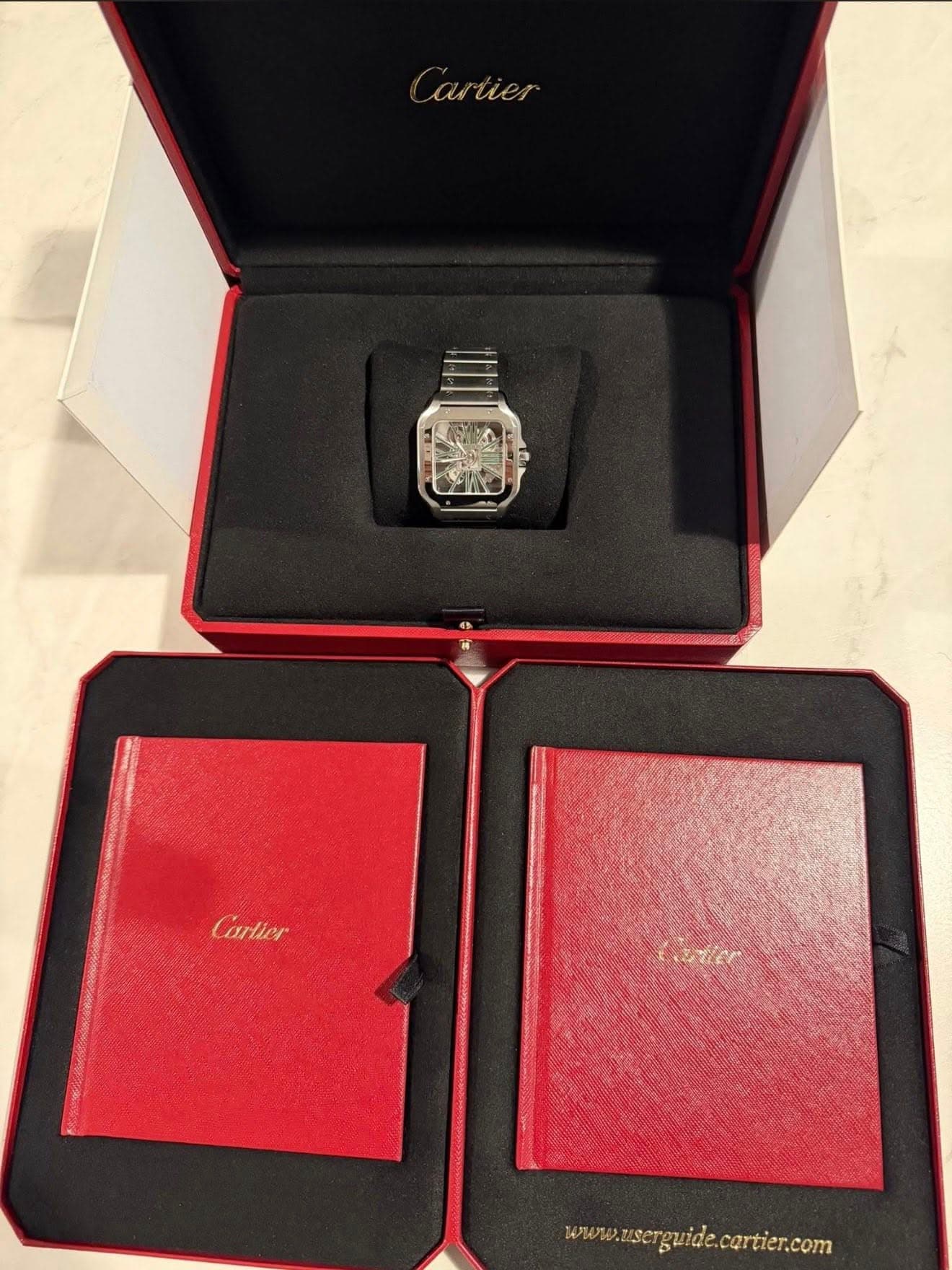 May be an image of wrist watch and text that says 'aruer Cartier