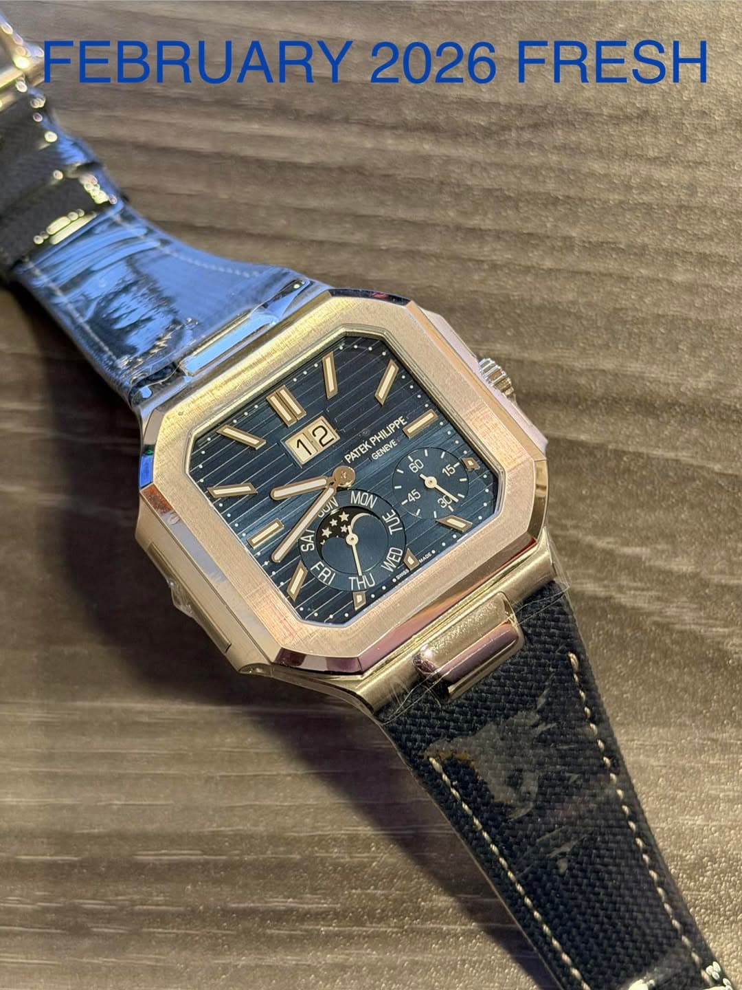May be an image of wrist watch and text that says 'FEBRUARY 2026 FRESH በበክ 1 II 12 2 IPPE 1 PATEK GENEVE: KPHILIPPE GthcY - JUIV MON 45 ከ e 3 i πε SAI 8 THU WED Srade - 1'