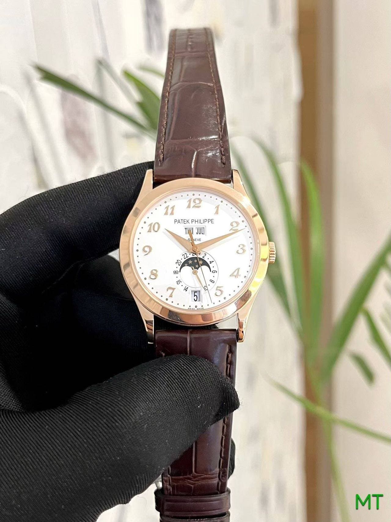 May be an image of digital watch, leather and text that says ' PATEKP PHIL PHILIPPE IPPE a C 9 22 M 3ว 8 E MUOAII 것 2 T ជ . い 7 ى က ထ ဟ ម = 5 MT'