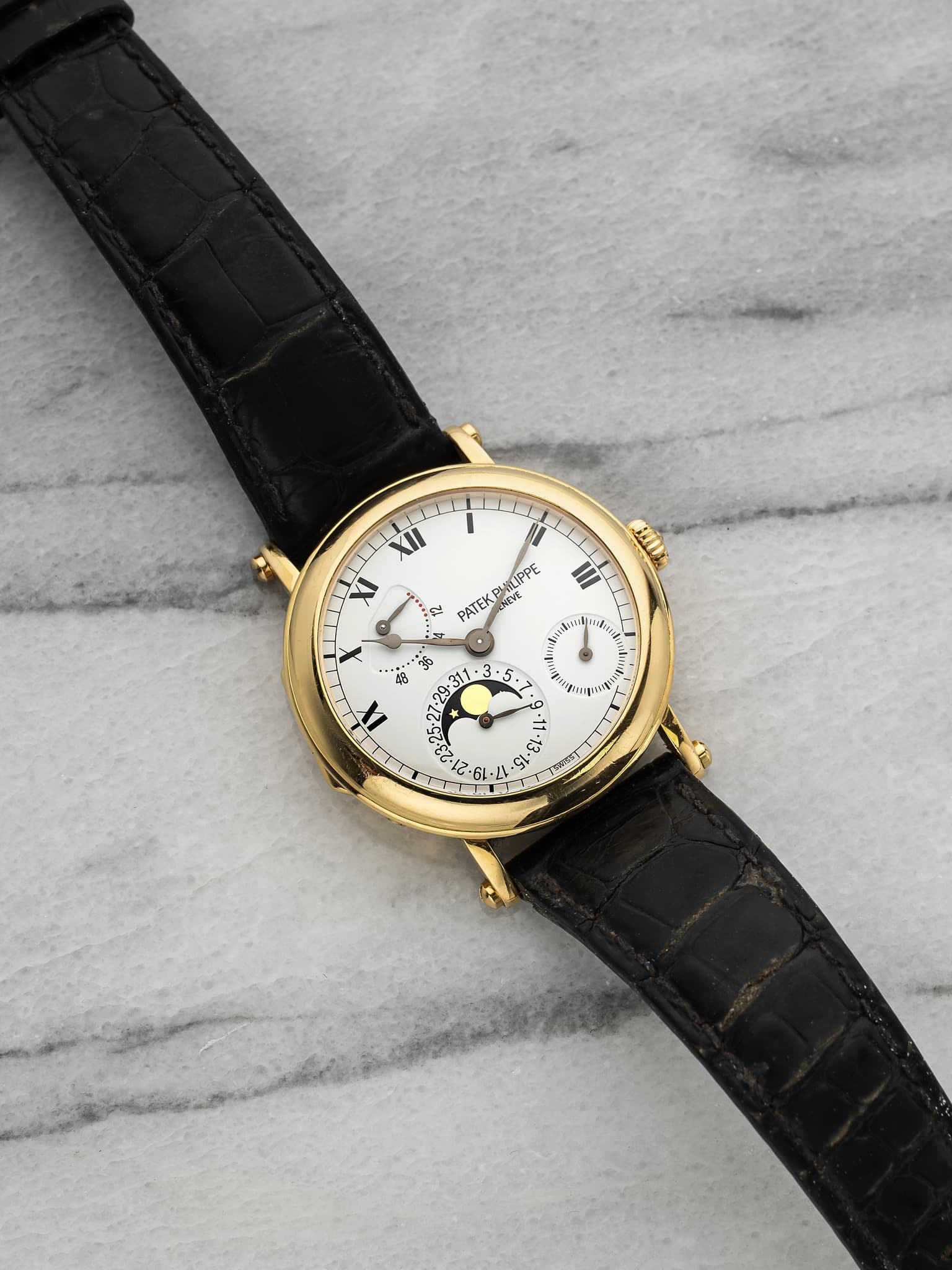 May be an image of wrist watch and text