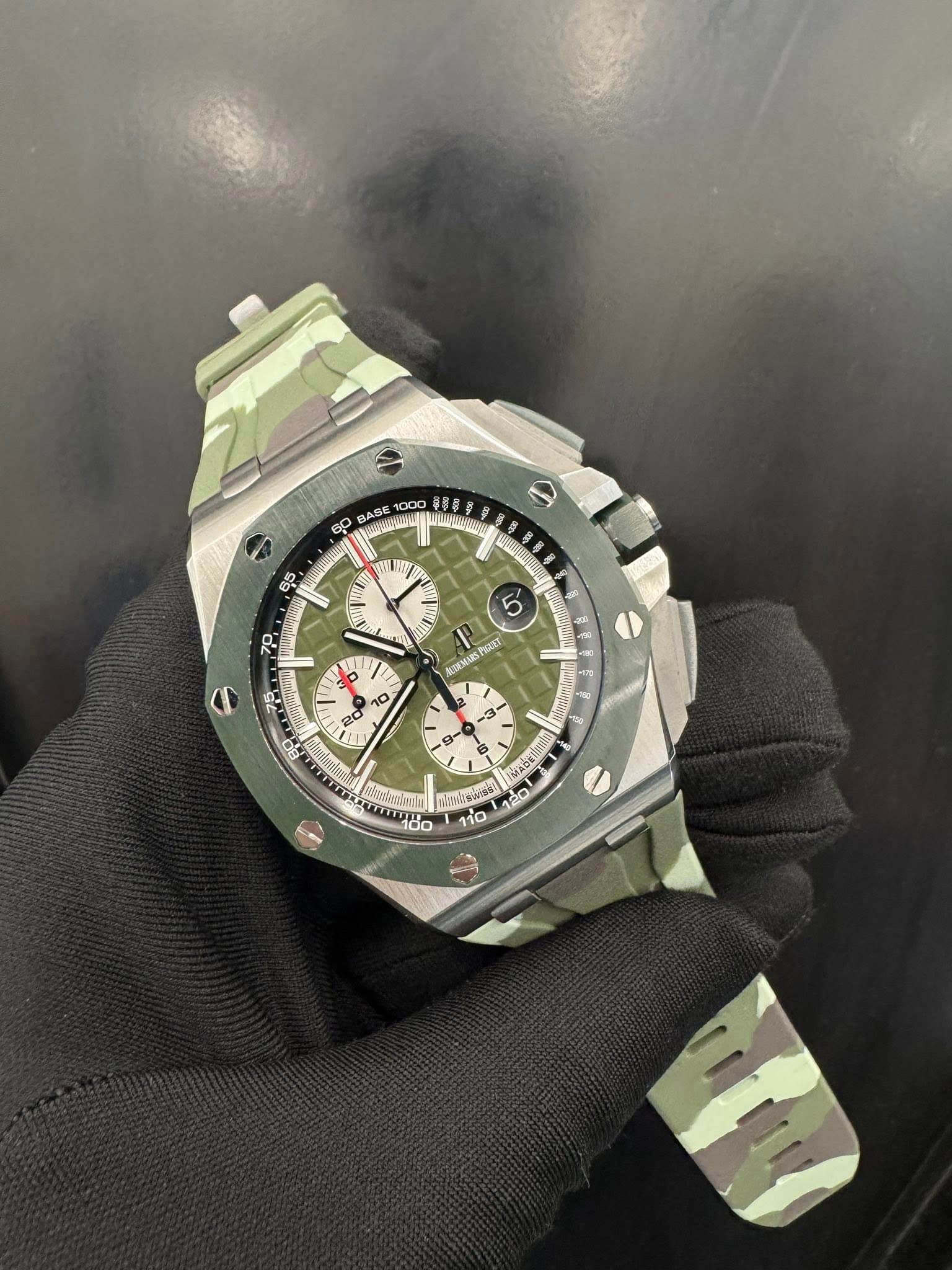 May be an image of wrist watch and text