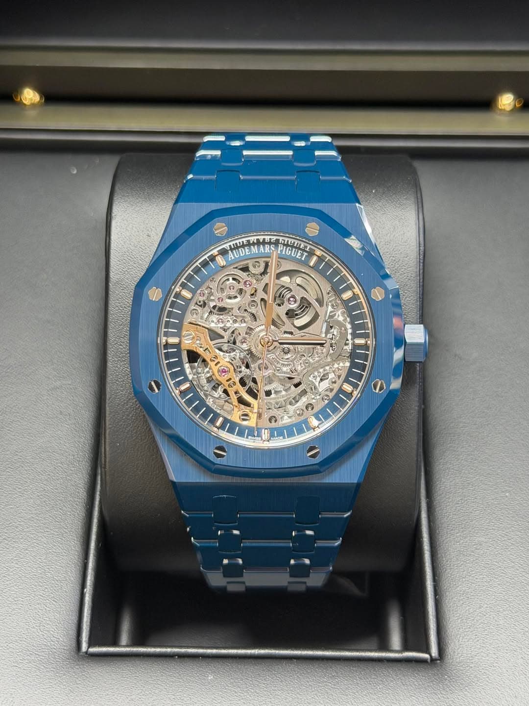 May be an image of wrist watch and text