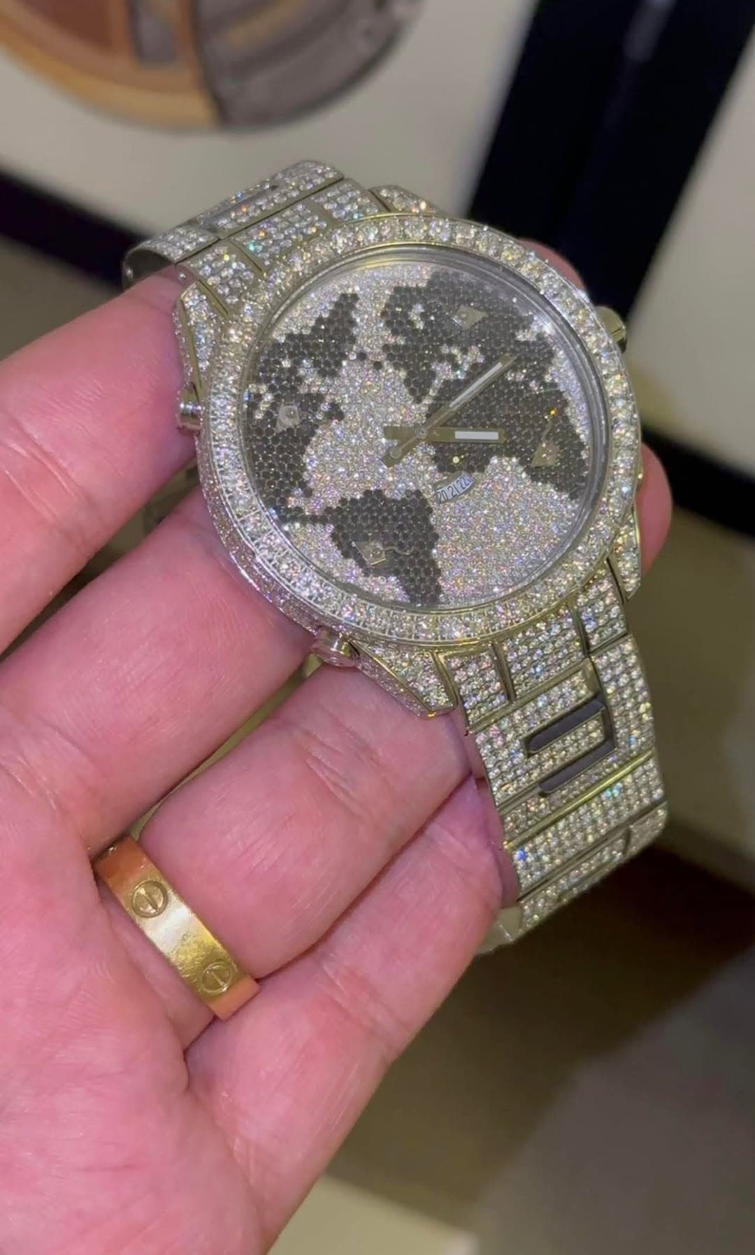 May be an image of wrist watch