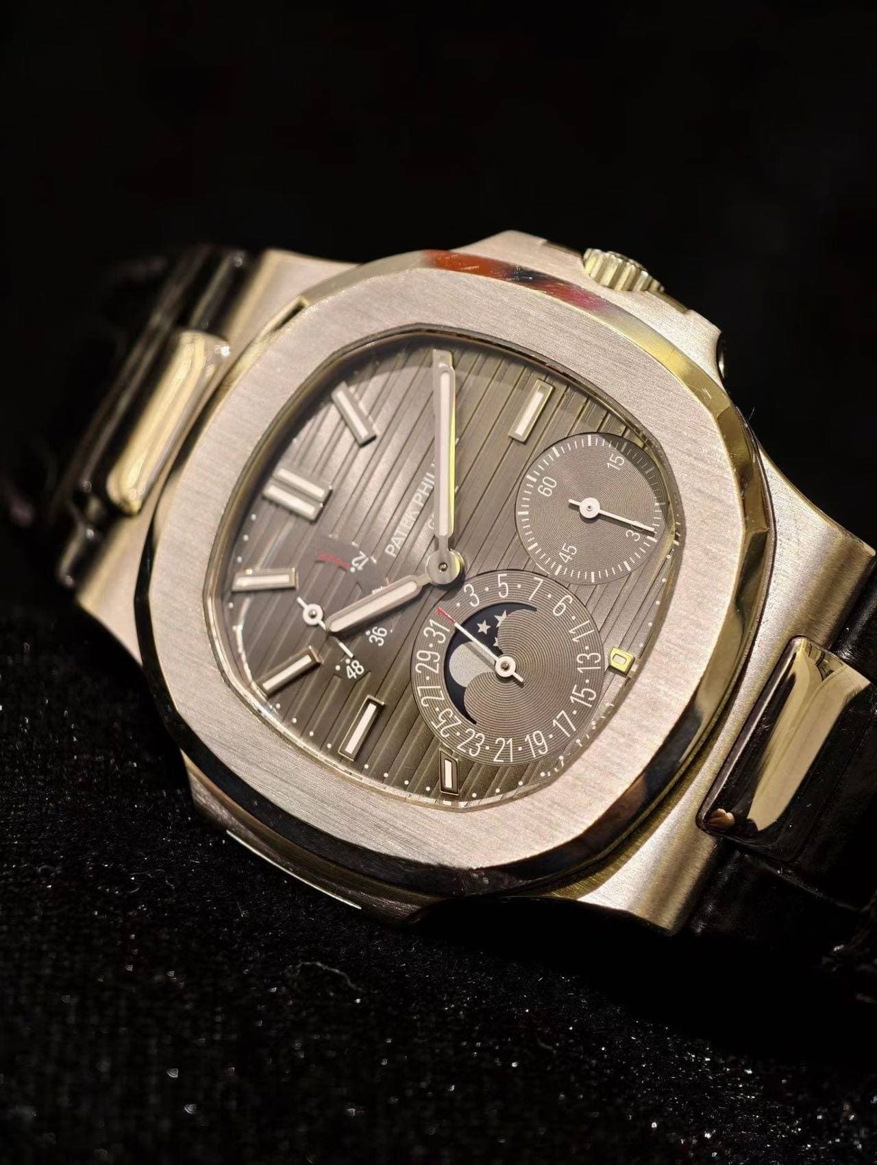 May be an image of wrist watch and text