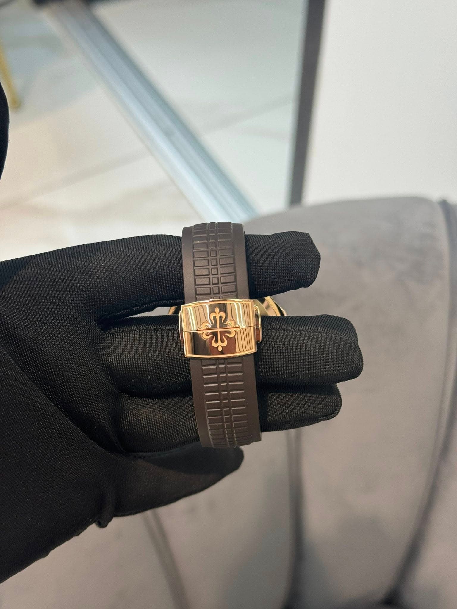 May be an image of wrist watch and text