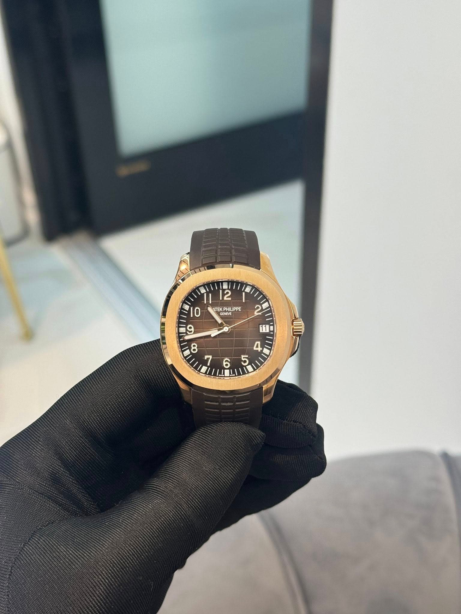 May be an image of wrist watch and text