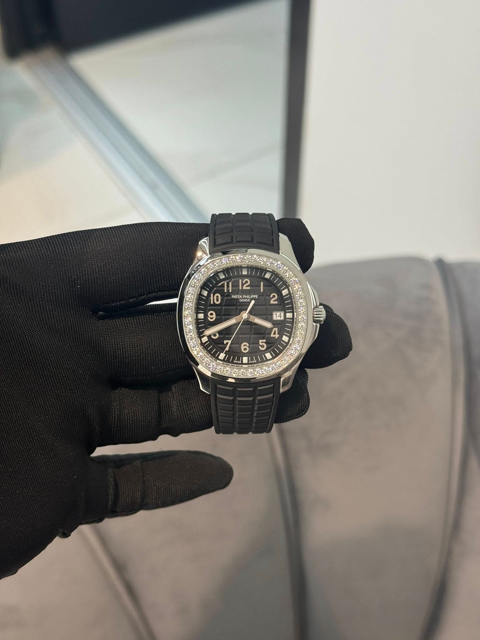 May be an image of wrist watch and text