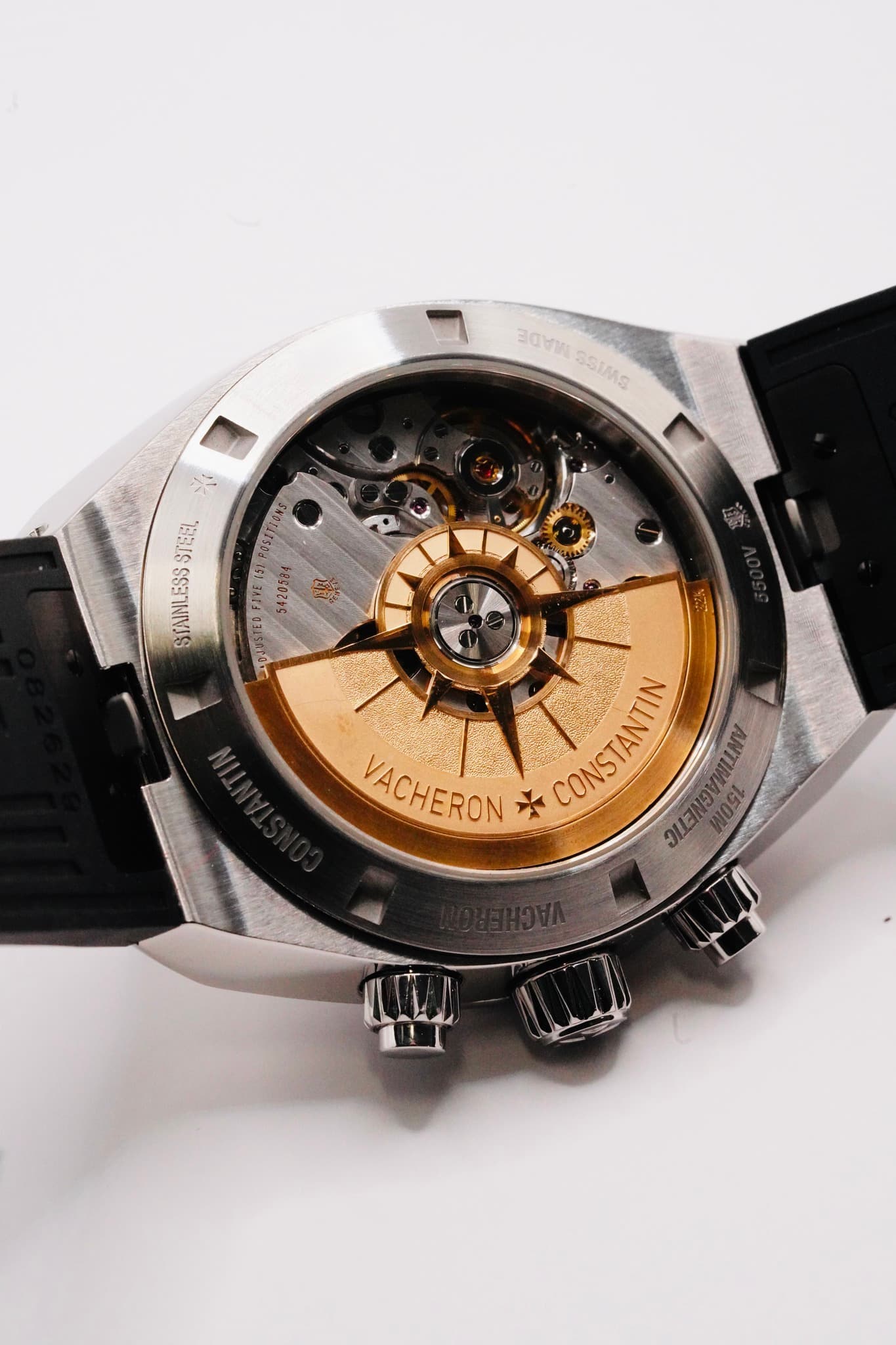 May be an image of wrist watch and text