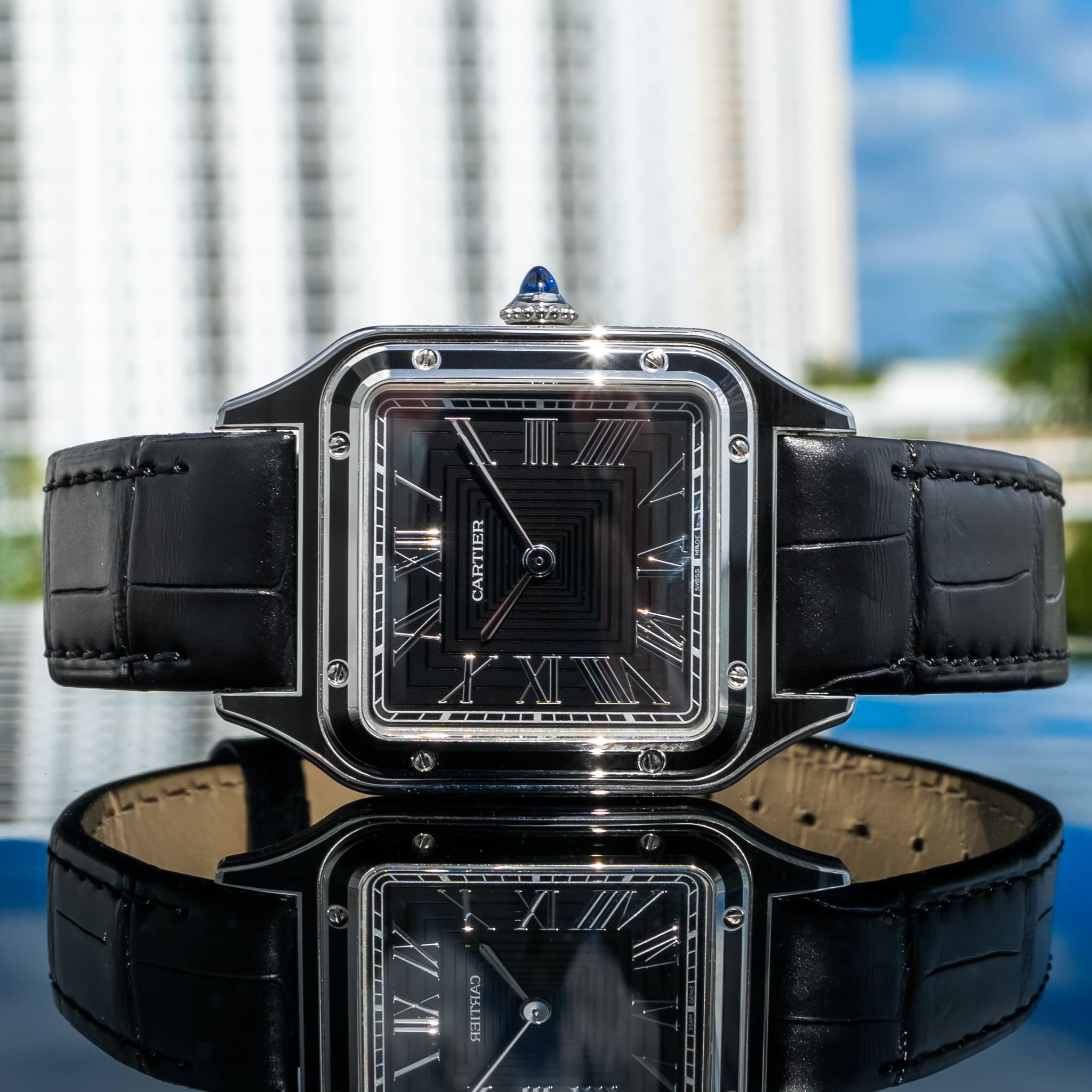 May be an image of wrist watch and text