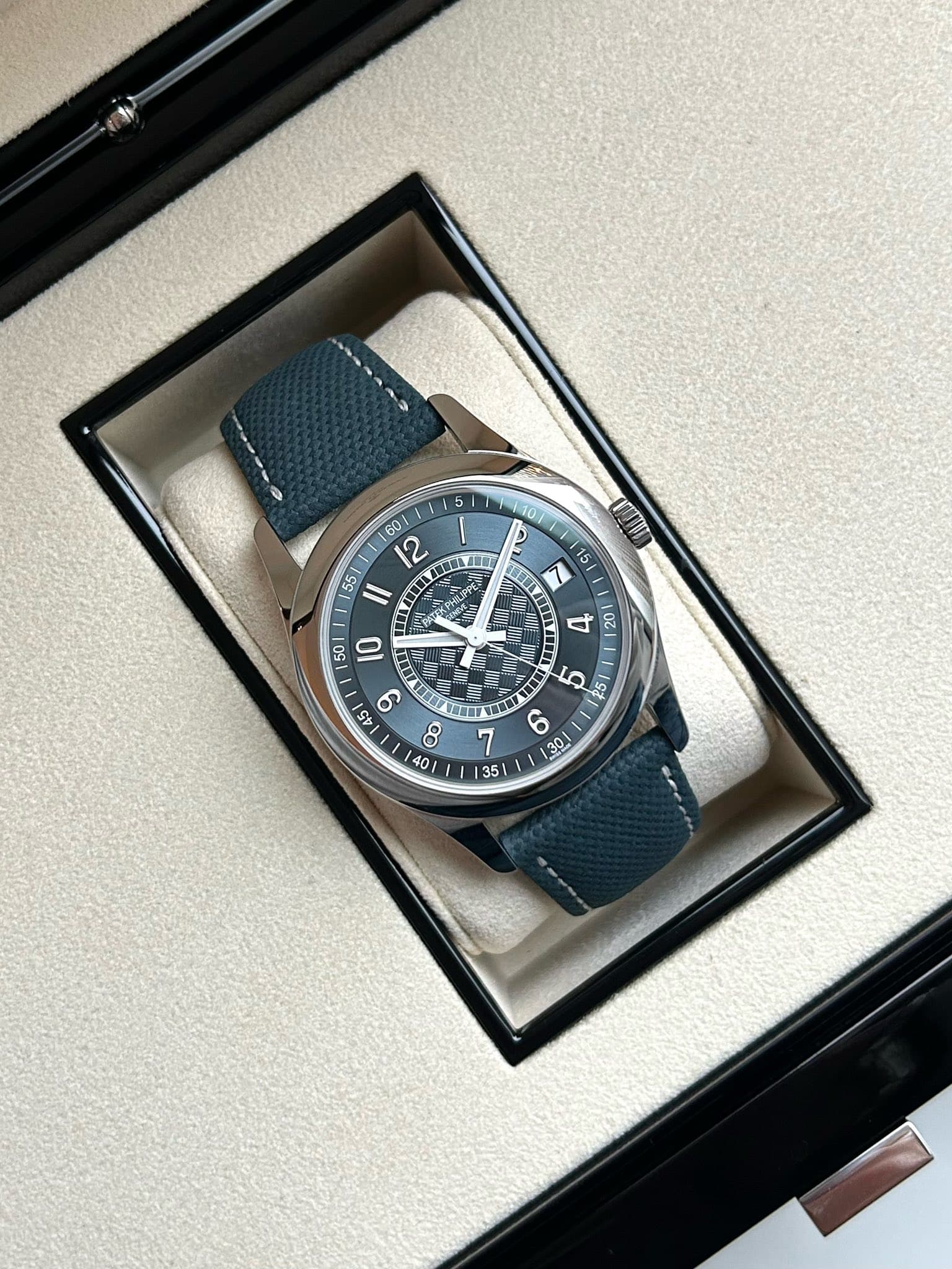 May be an image of wrist watch and text