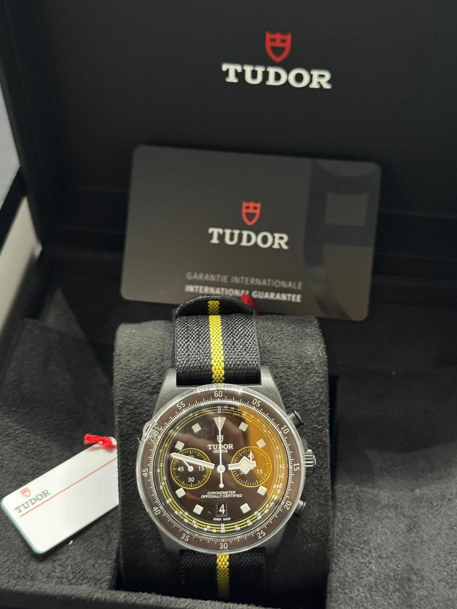 May be an image of wrist watch and text