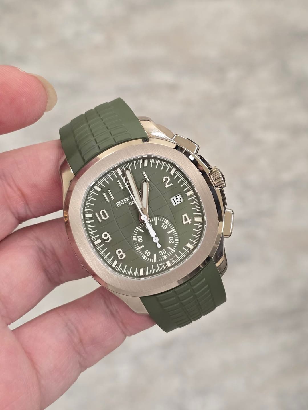 May be an image of wrist watch and text