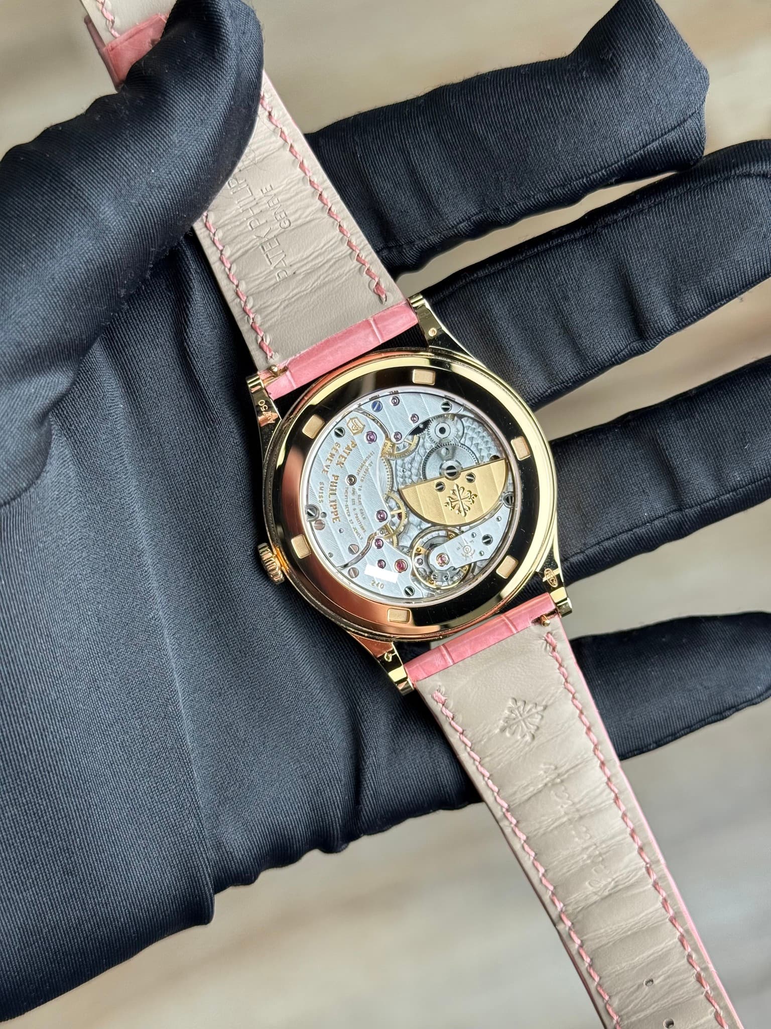 May be an image of wrist watch and text