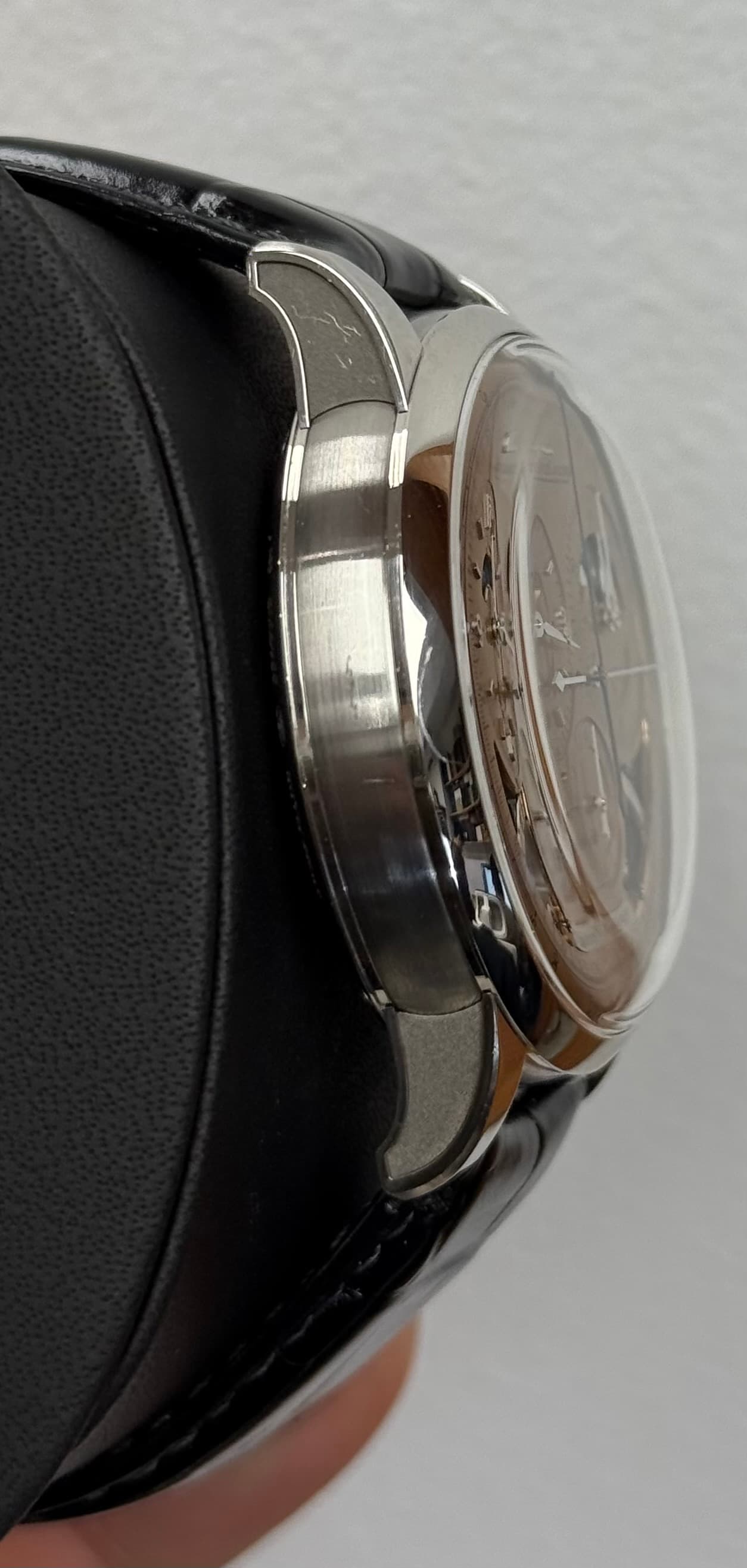 May be an image of wrist watch and text