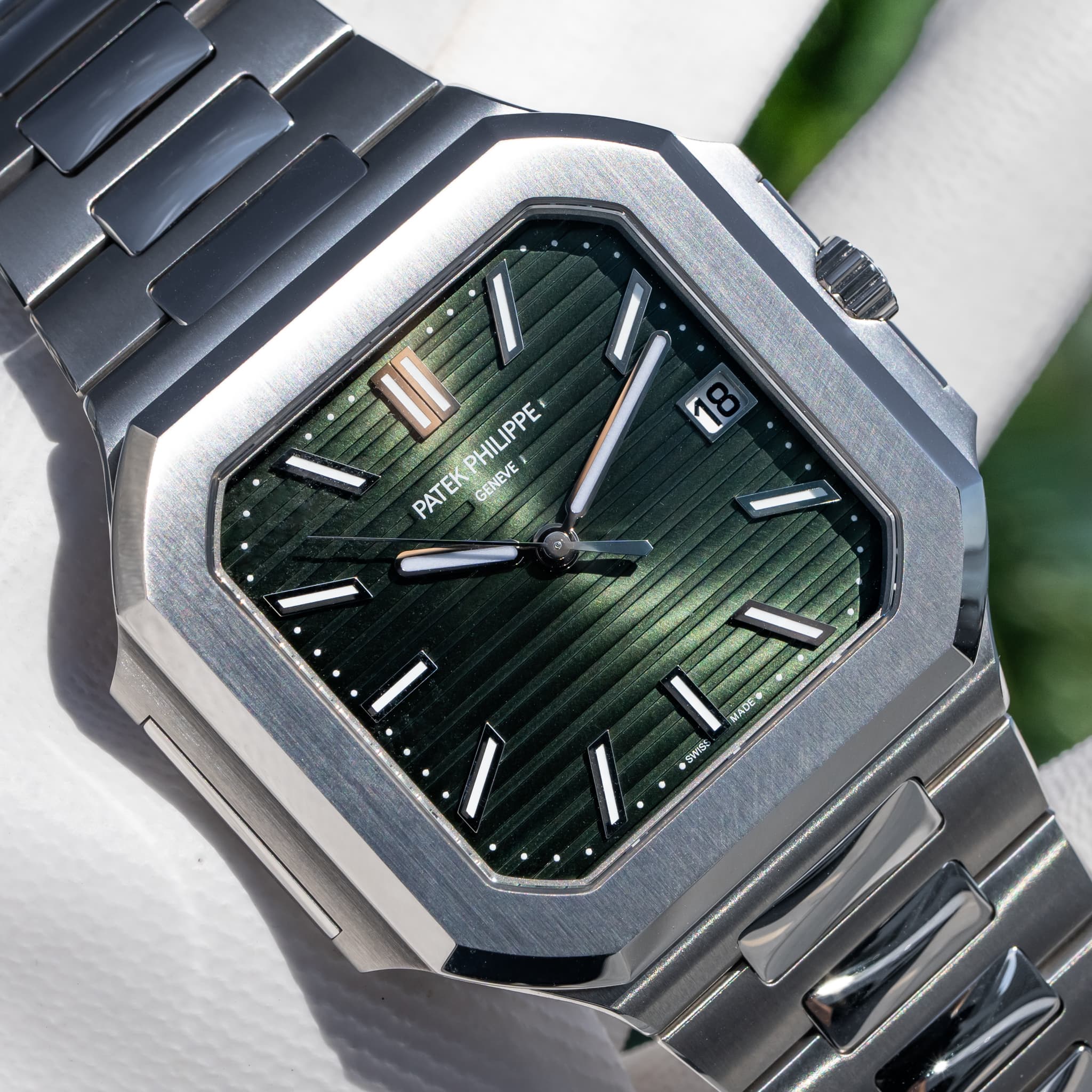May be an image of wrist watch and text