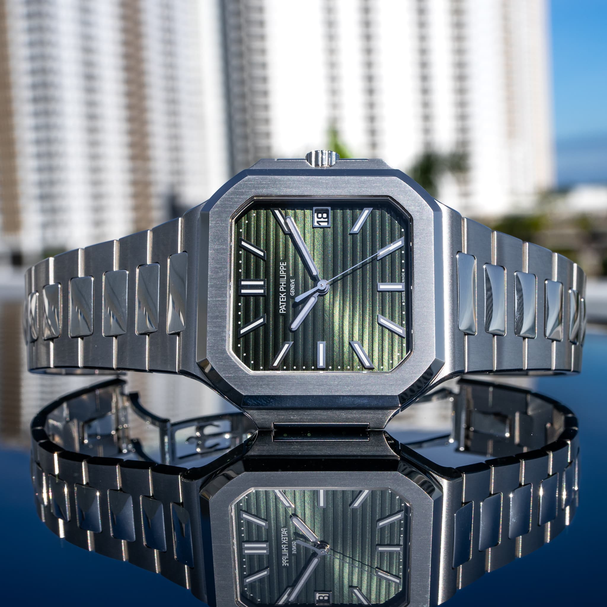 May be an image of digital watch and text that says 'HILIPPE PAT Fi altd PATEKPHIUPPE CИT ad งาวว ប ป IEK-'